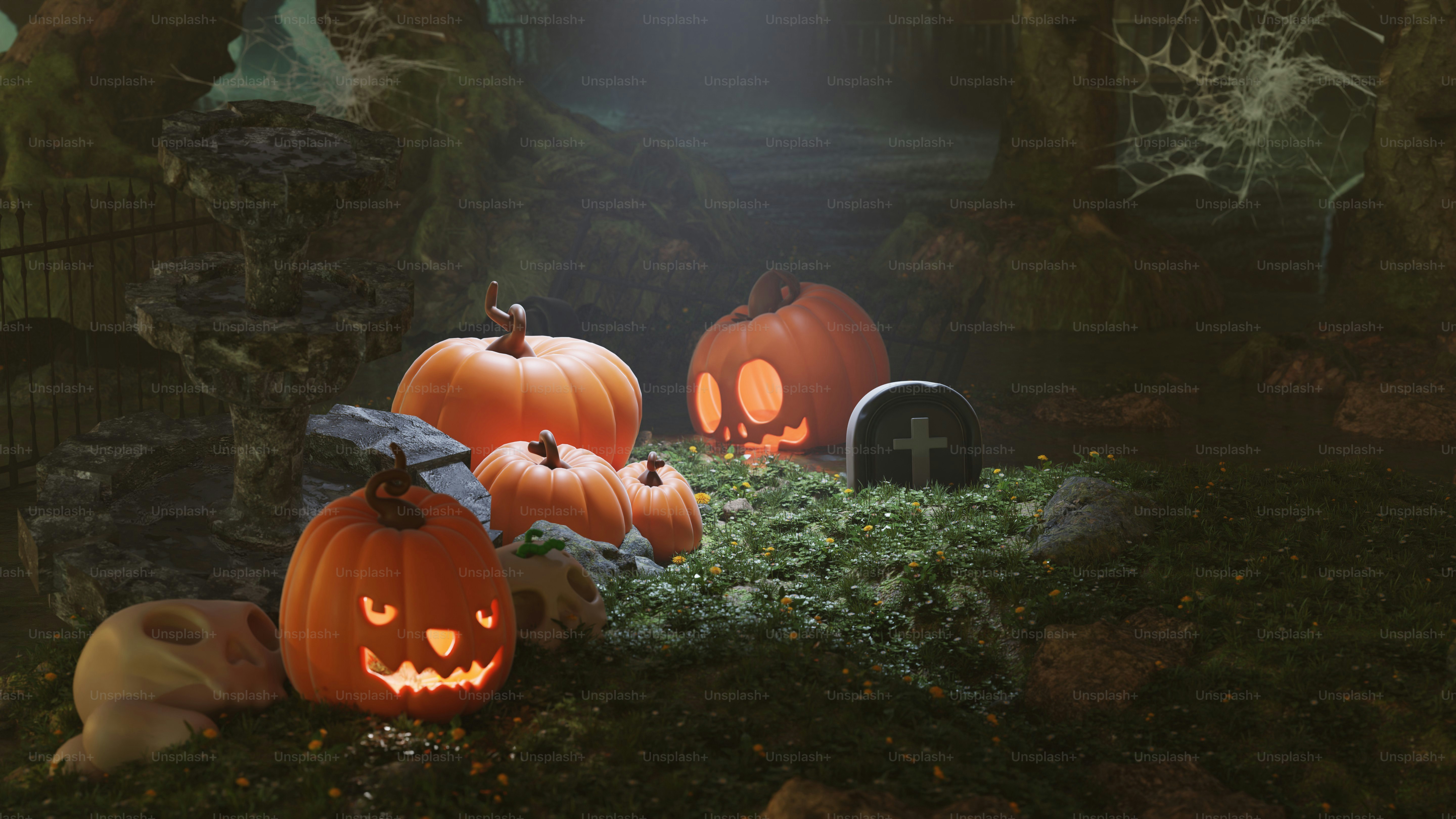 A group of pumpkins sitting on top of a moss covered ground