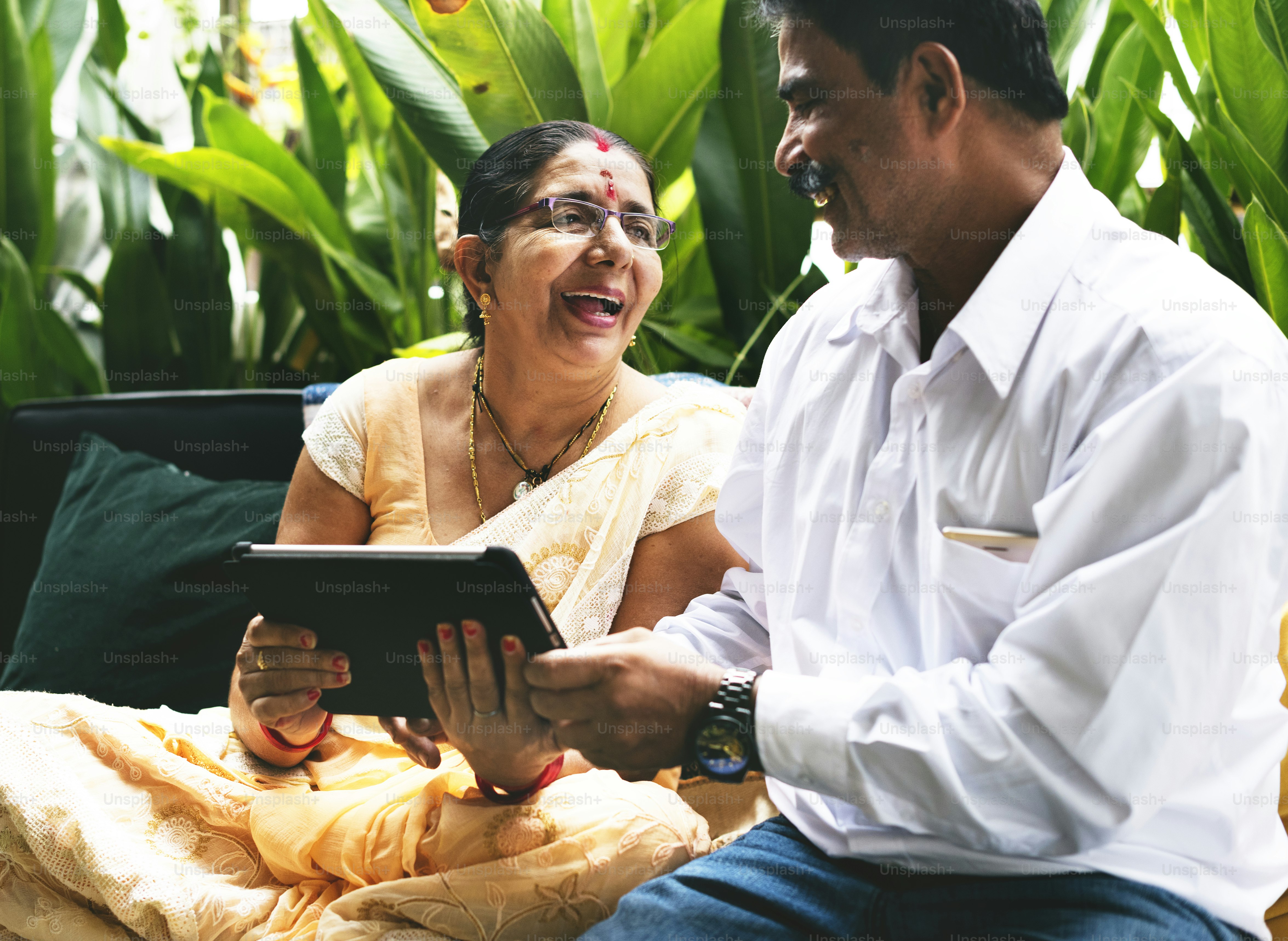 A happy Indian couple spending time together photo – Family Image on ...