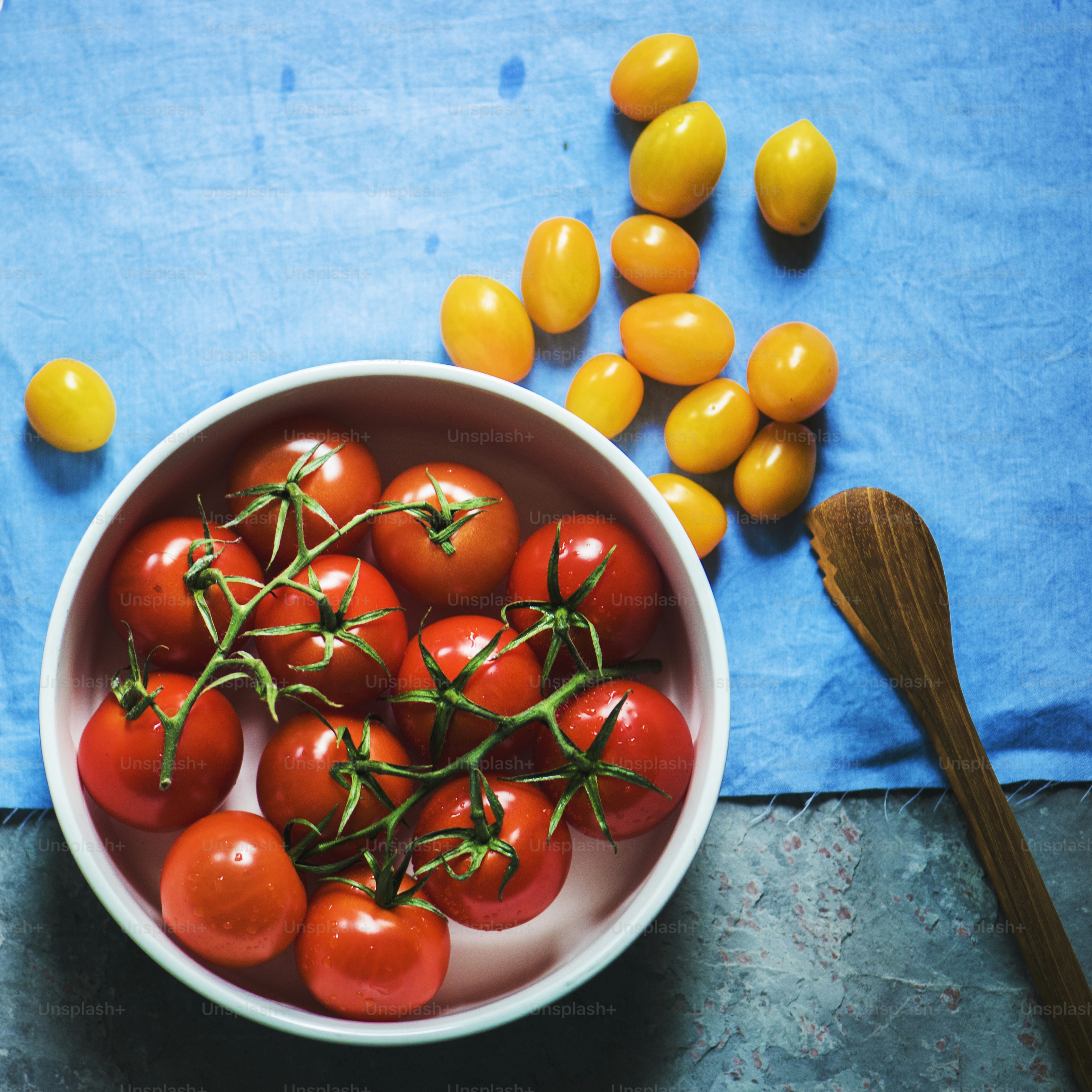 Closeup of fresh organic tomatoes in bowl