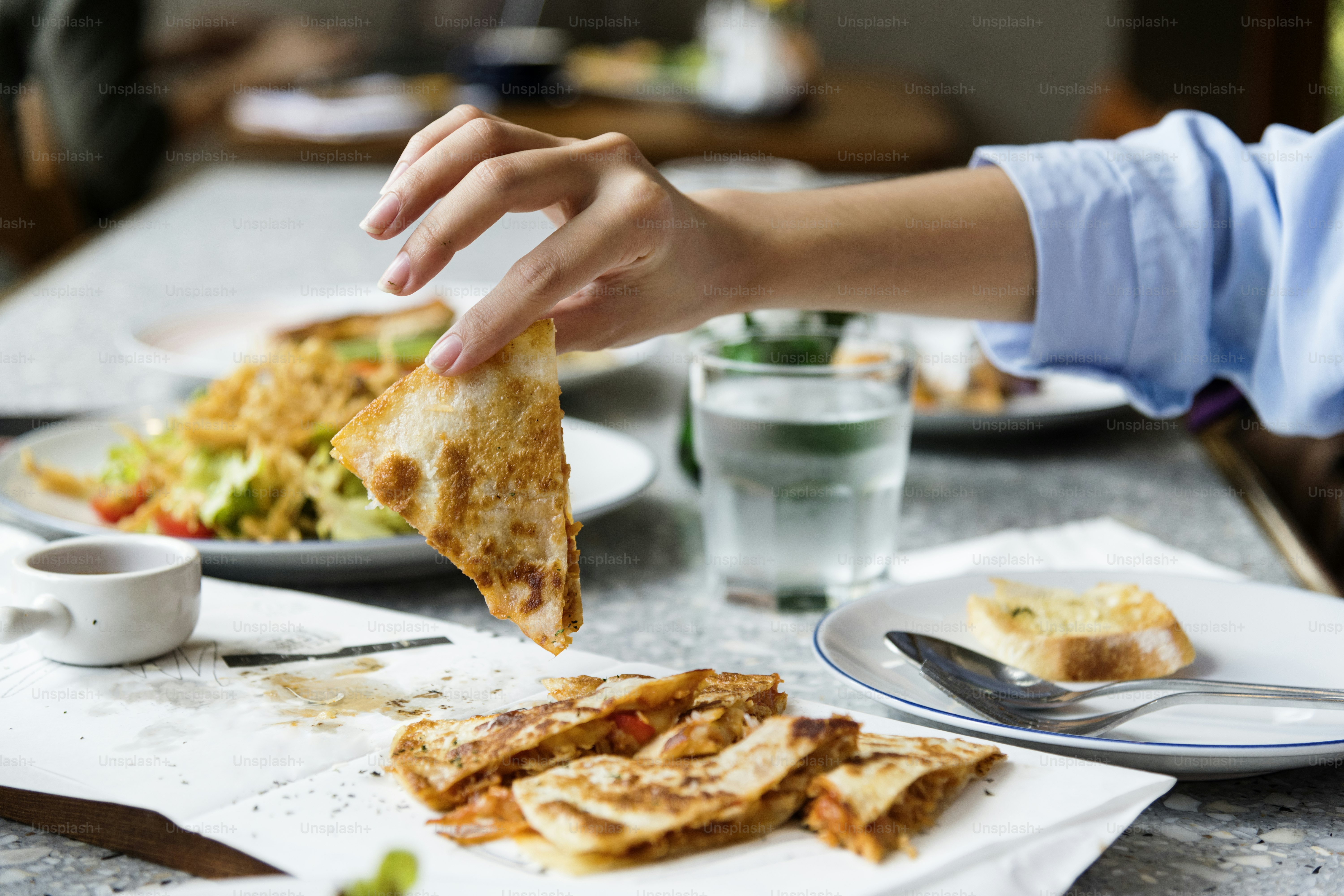 Close up of hand enjoying the food