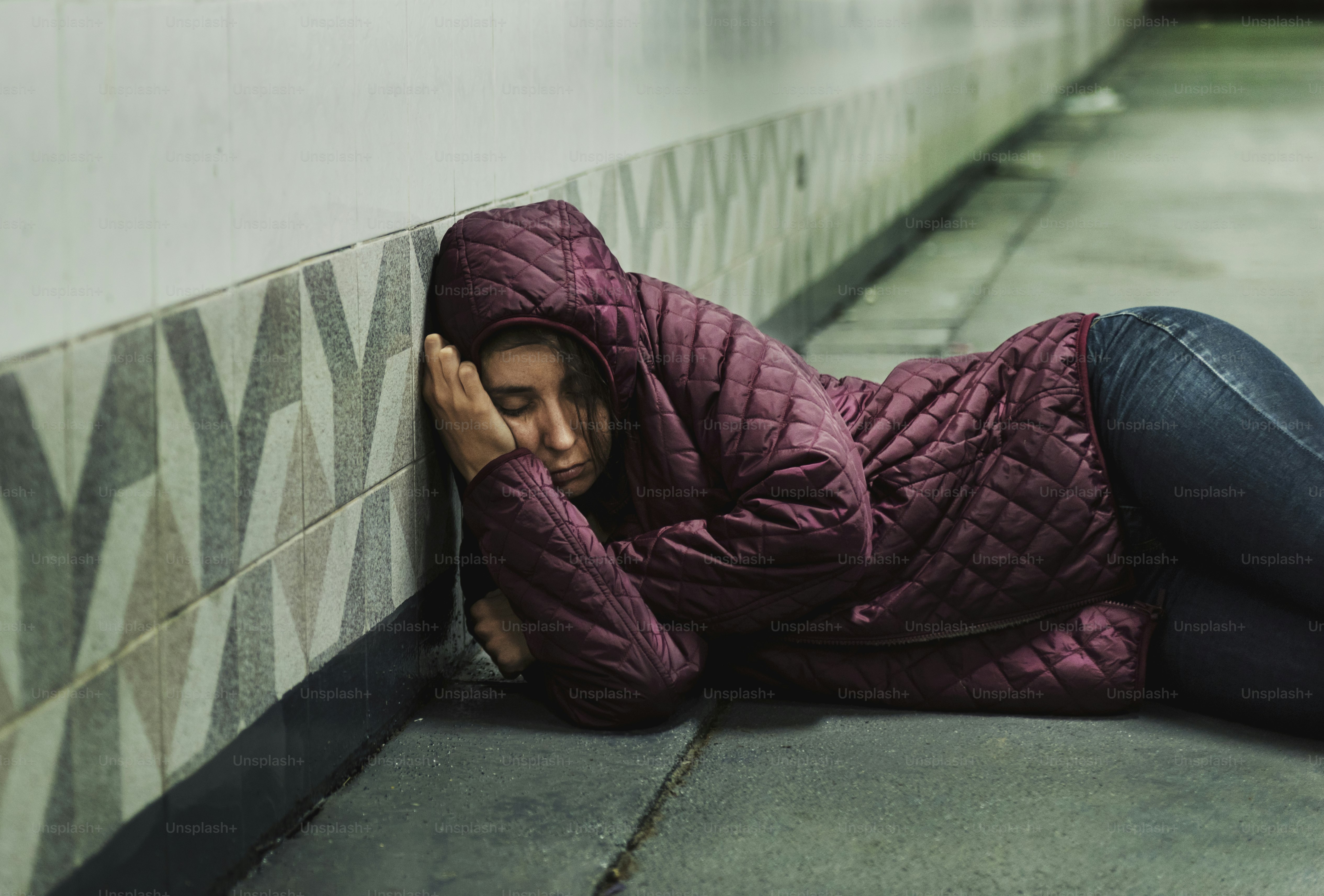 Homeless Woman Sleeping on The Floor