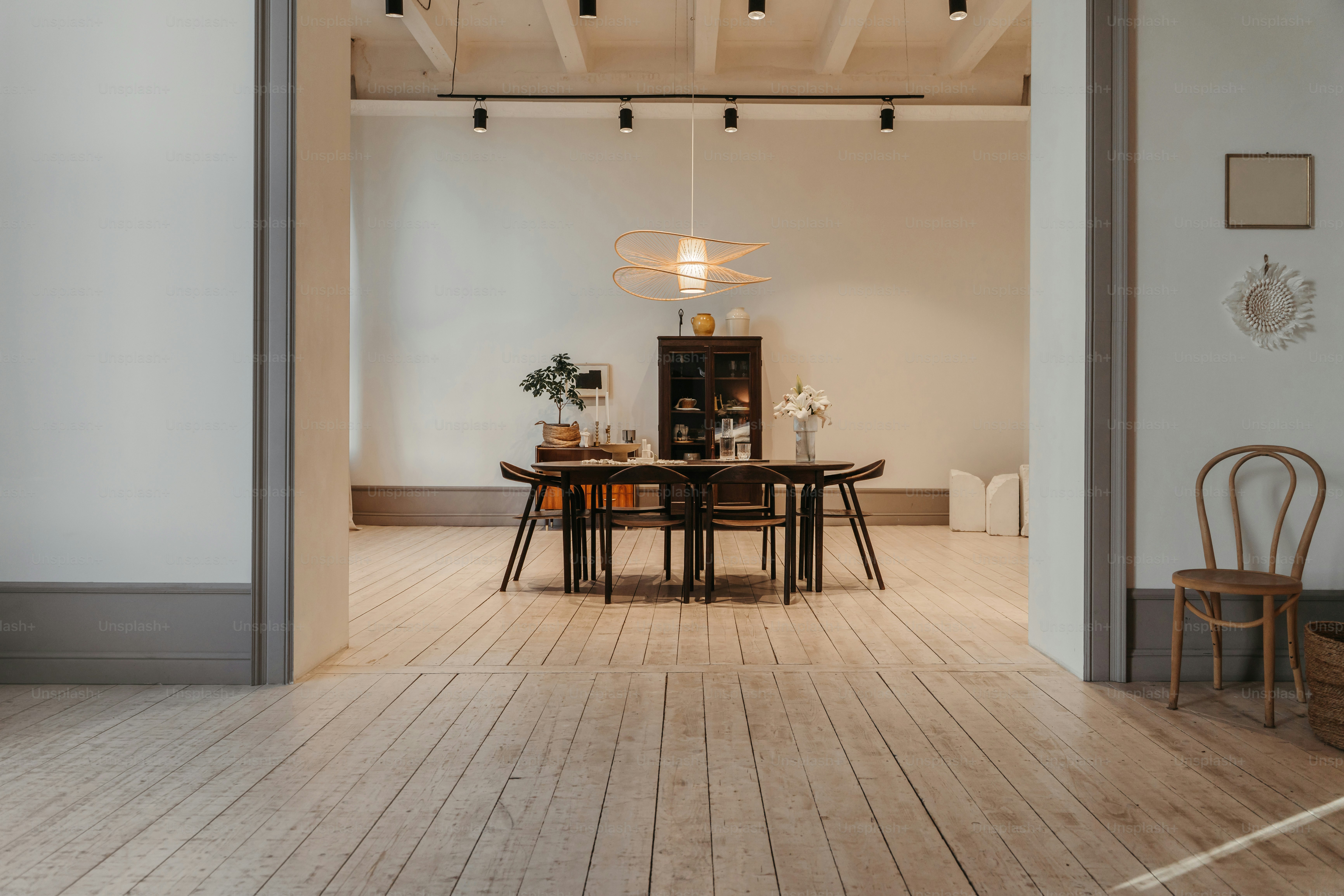 A large open room with a table and chairs