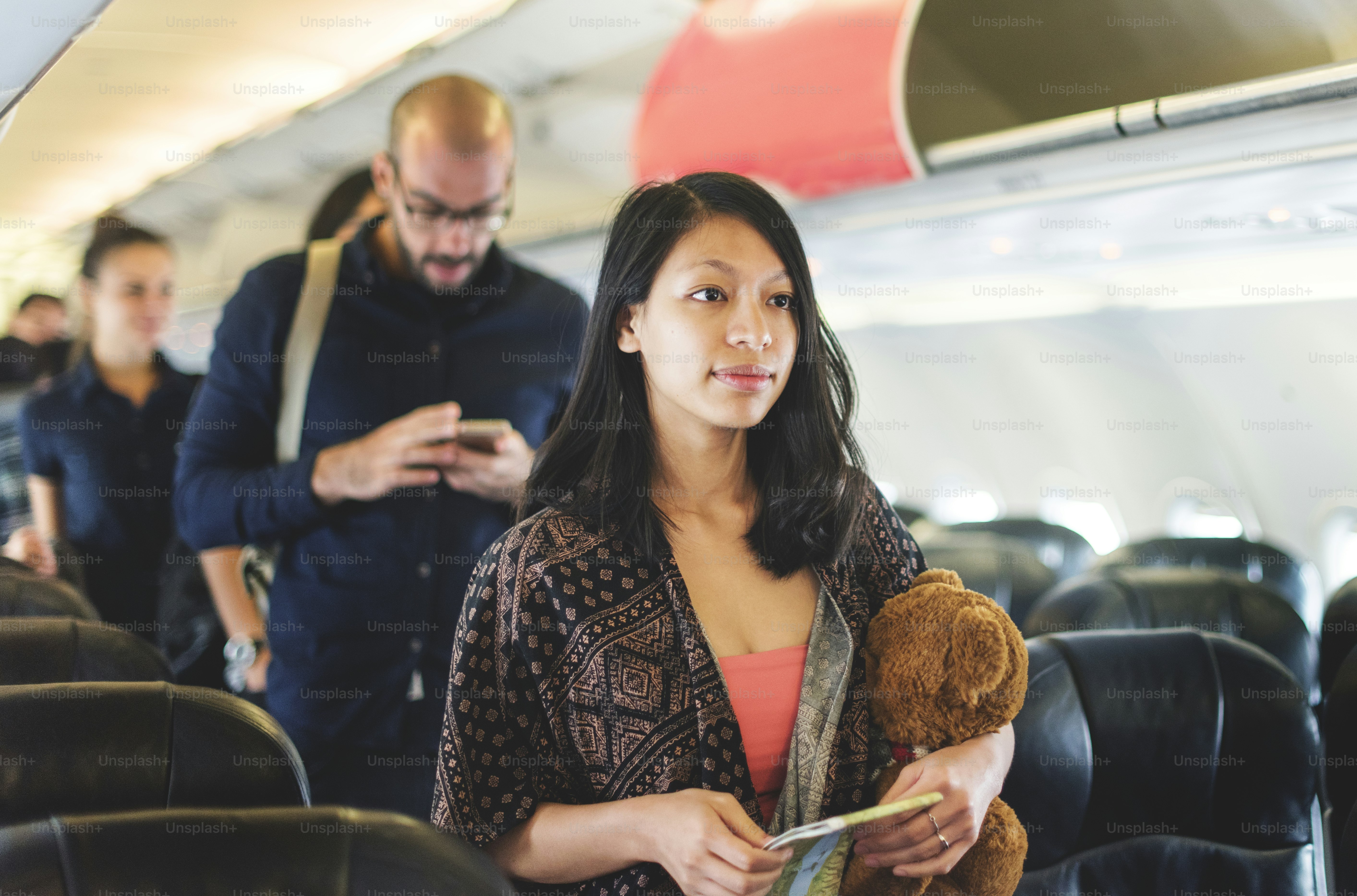A girl traveling by airplane