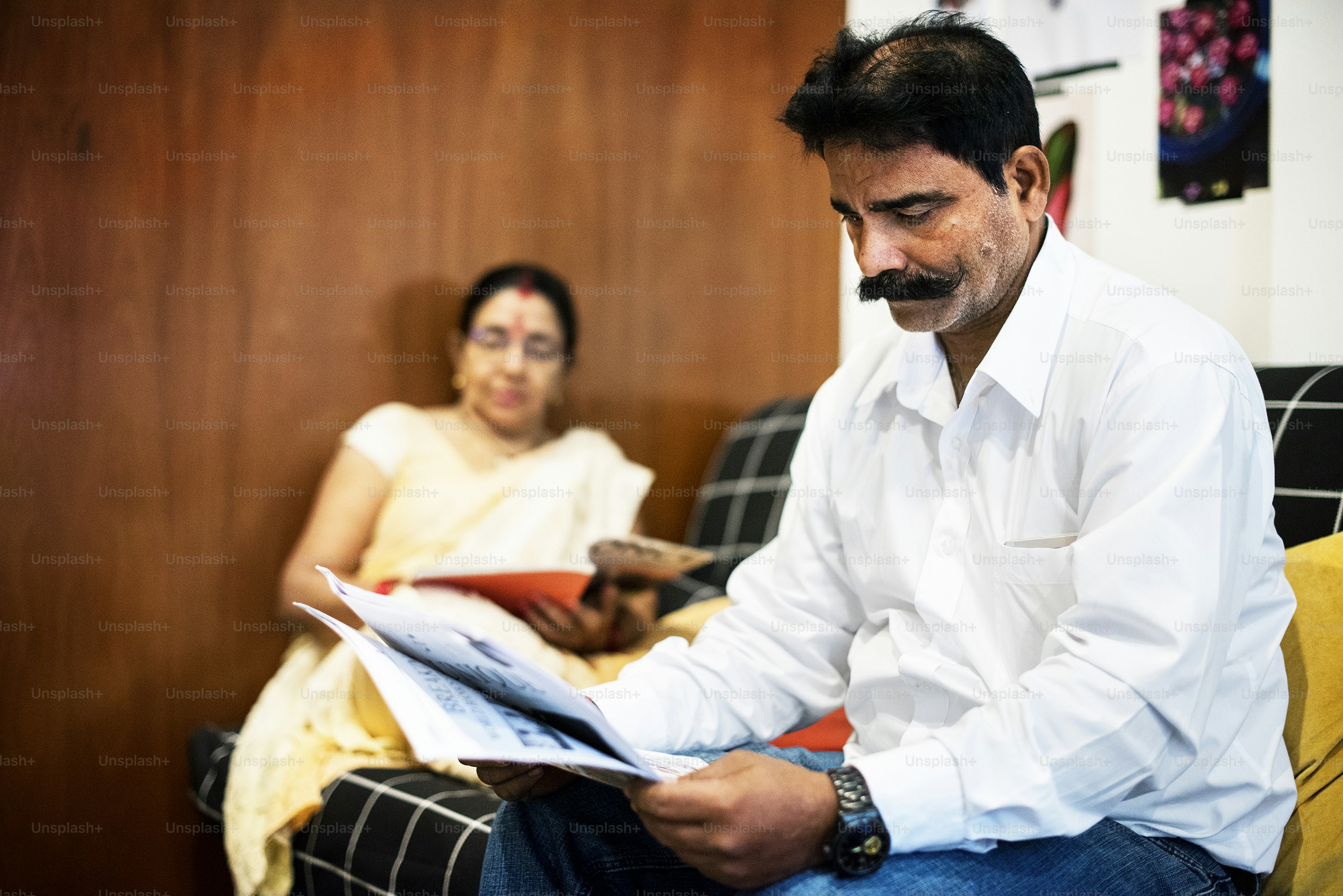 Ayurveda doctor India consulting wellness traveler during health assessment
