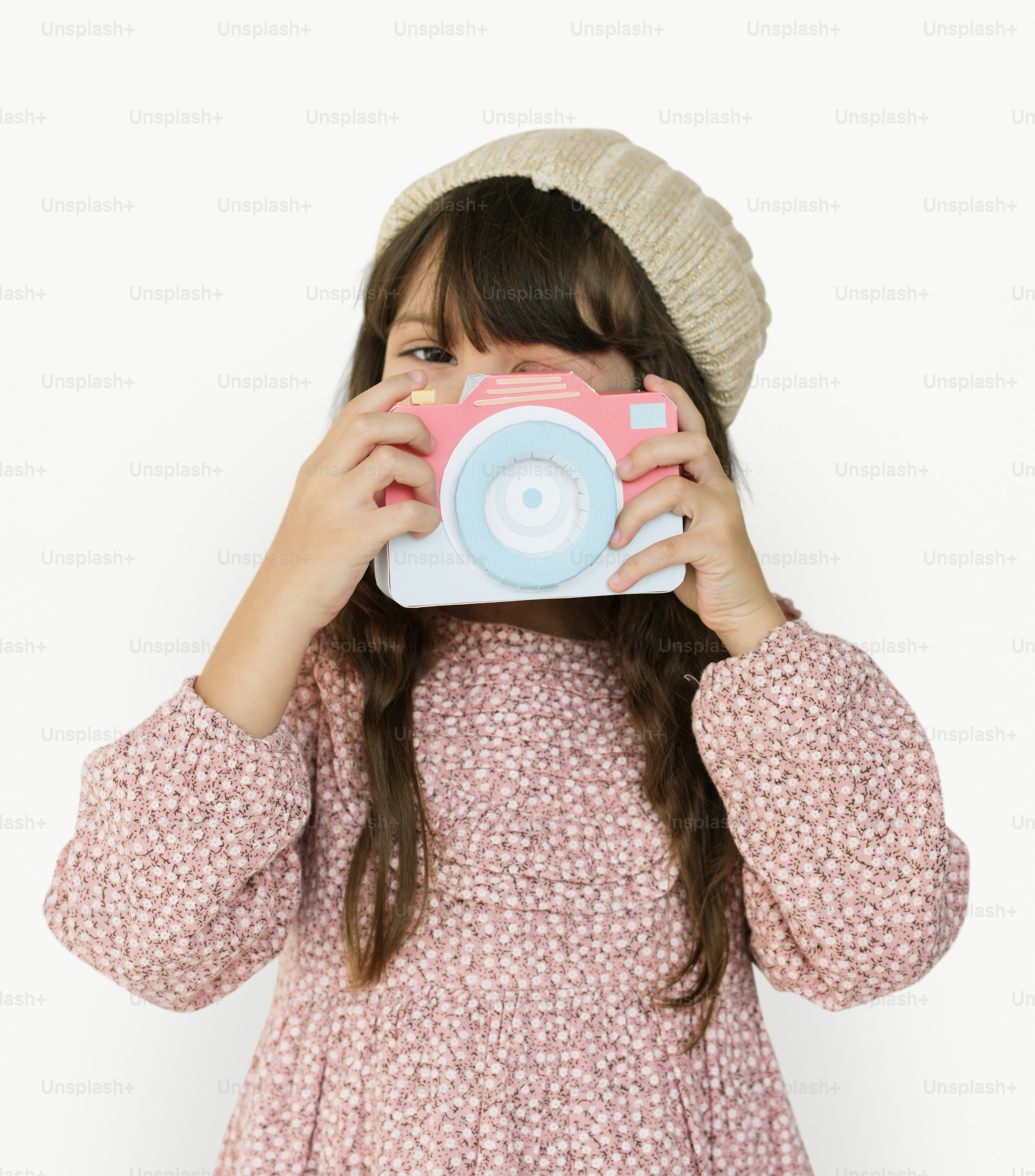Little Girl Holding Papercraft Arts Camera Photogrphing Studio Portrait
