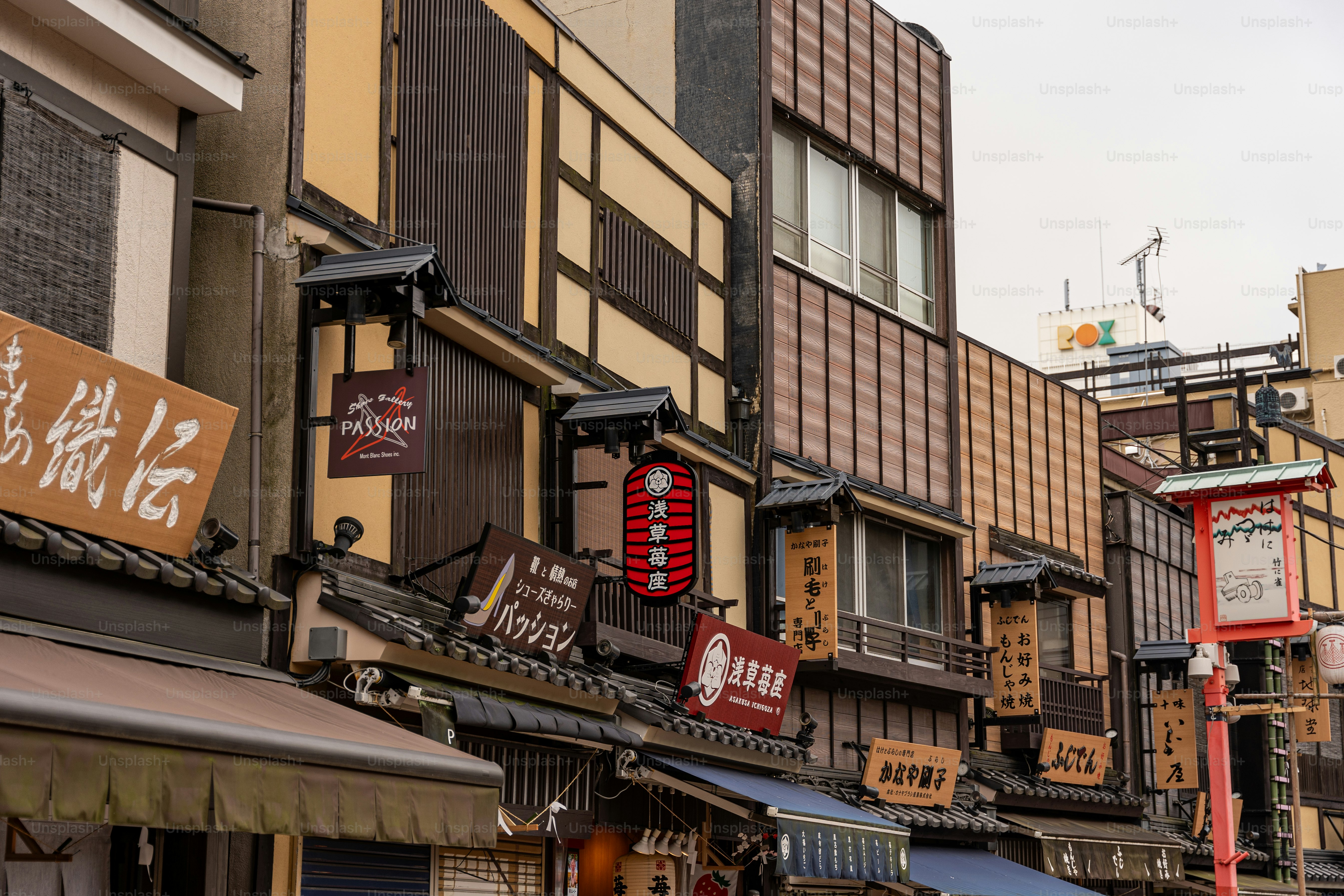 A city street filled with lots of tall buildings