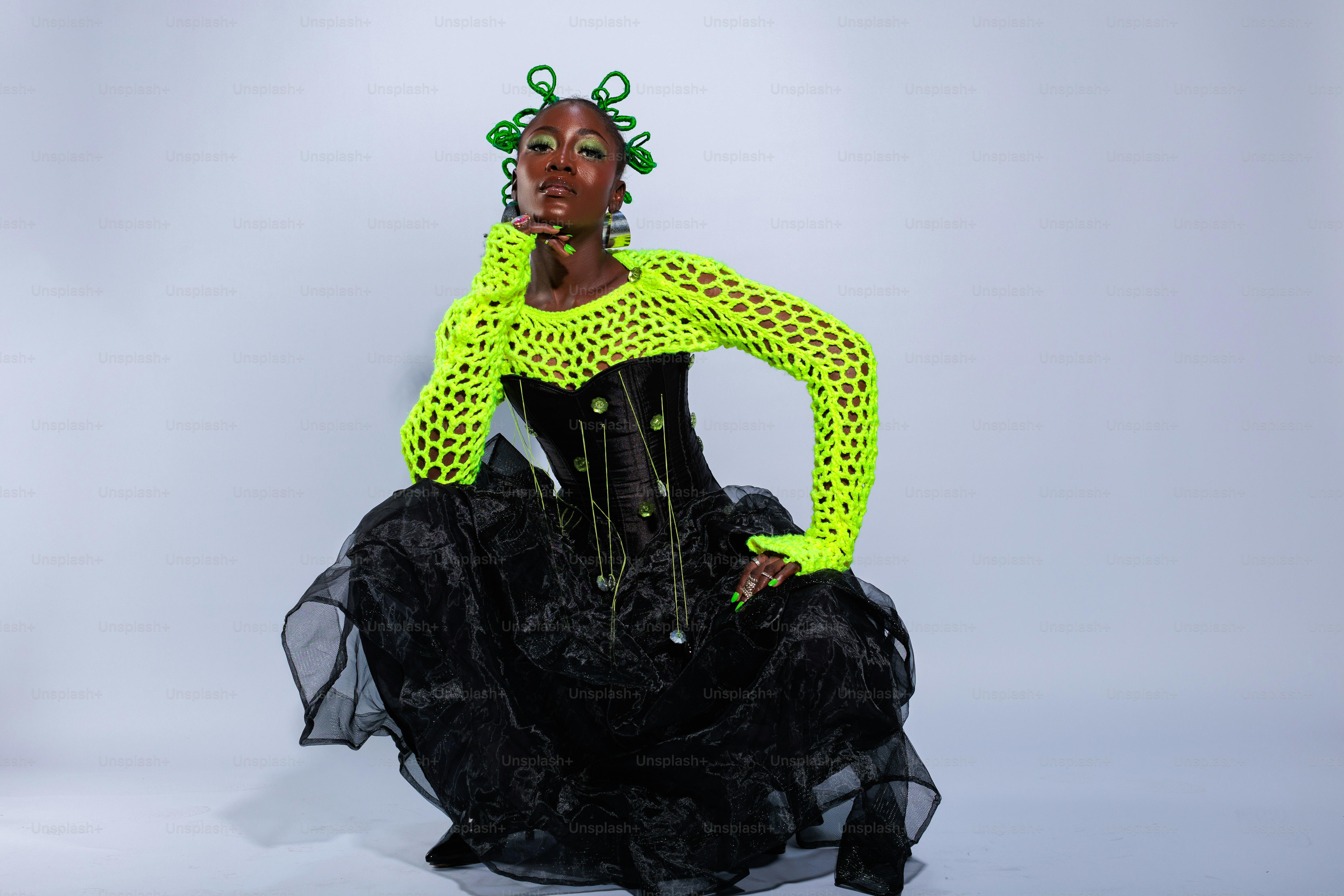 A woman in a black and yellow outfit