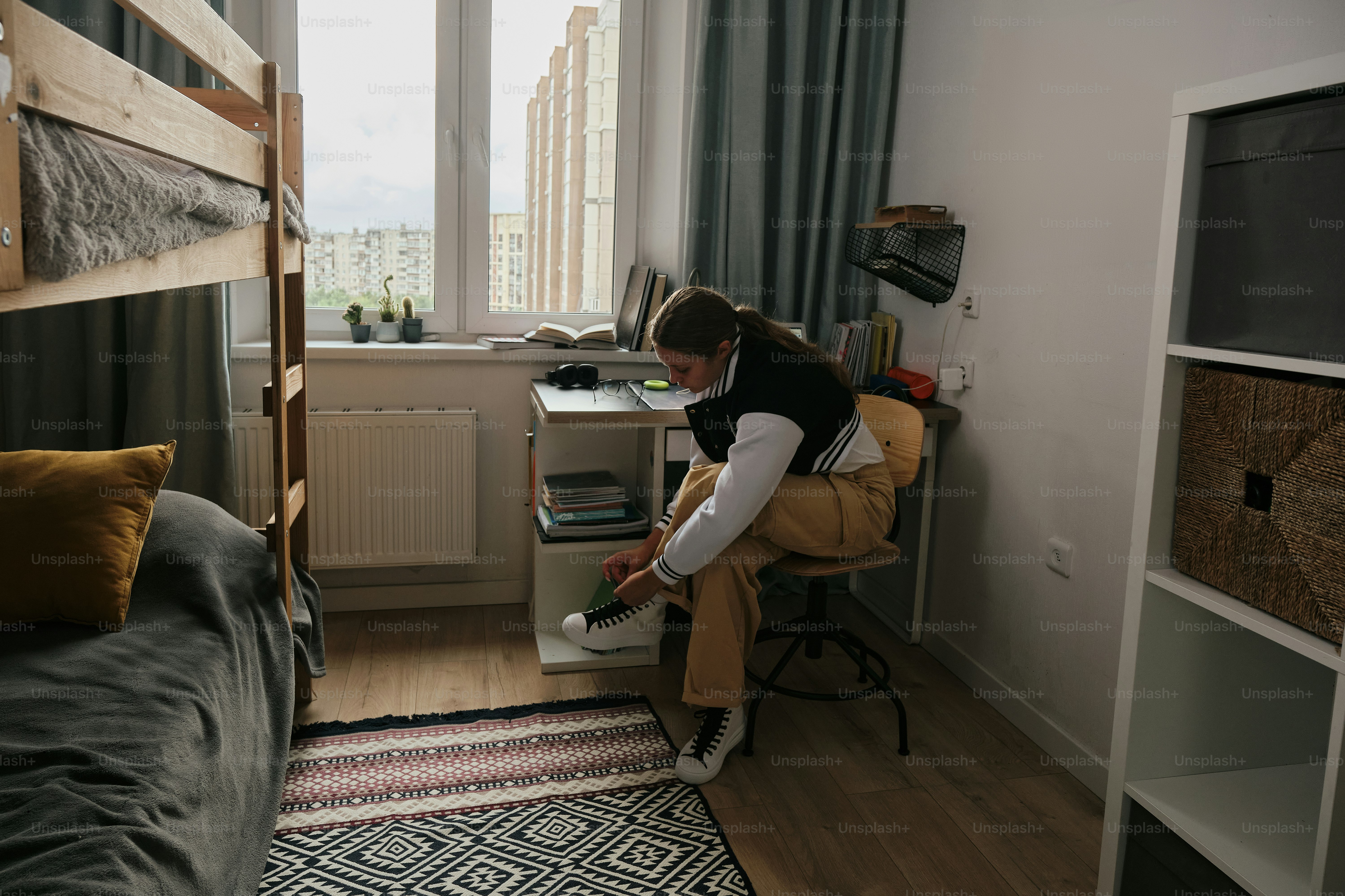 a student in a dorm room