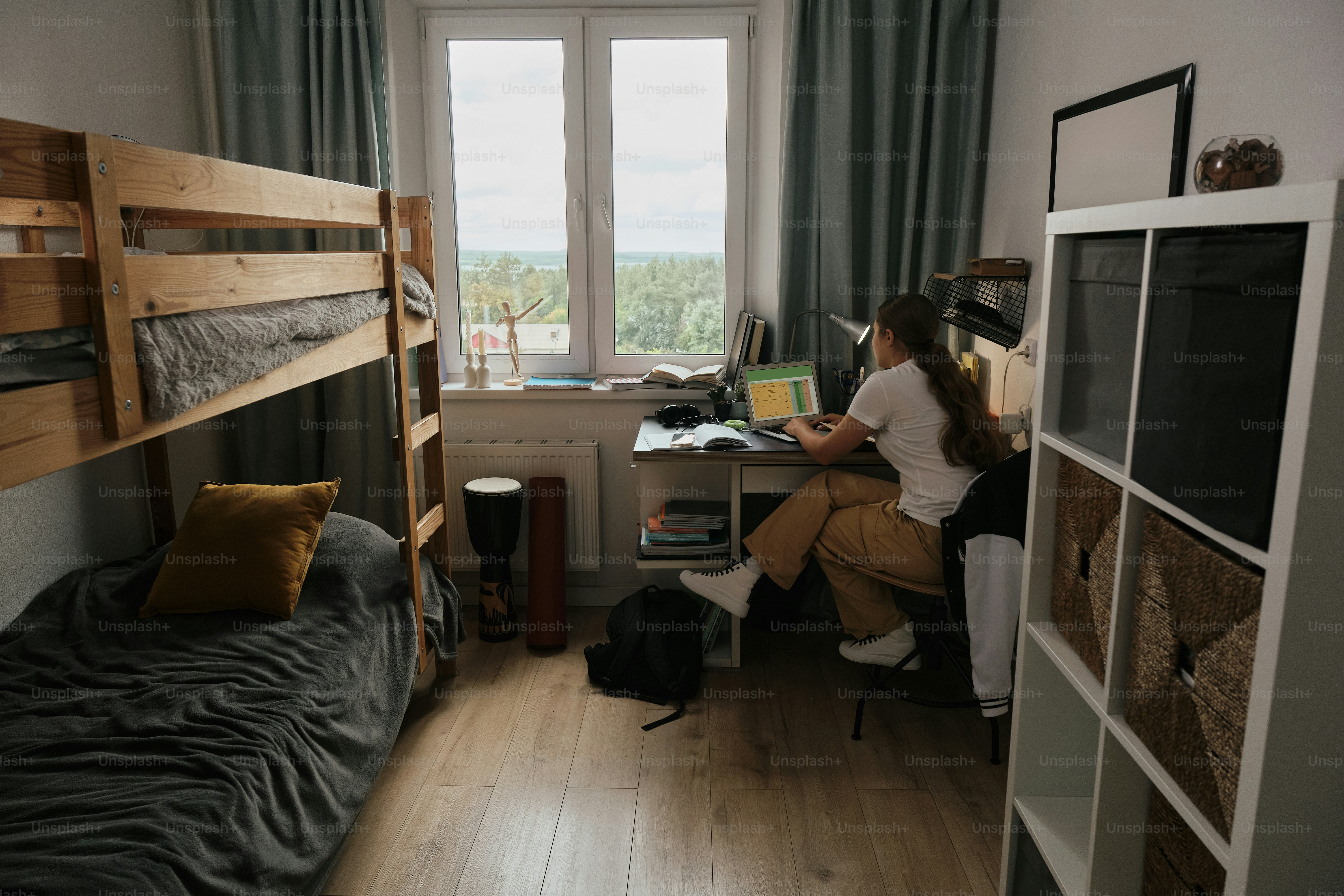 a student in a dorm room