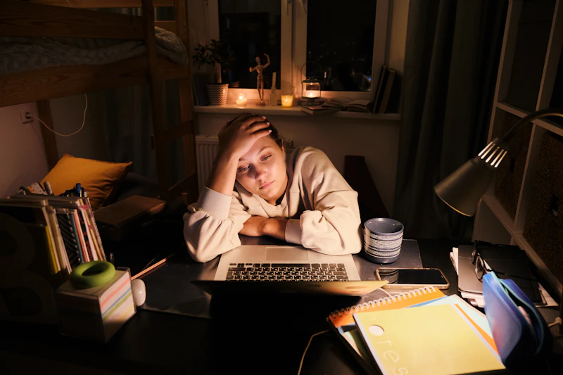 Student working late on laptop