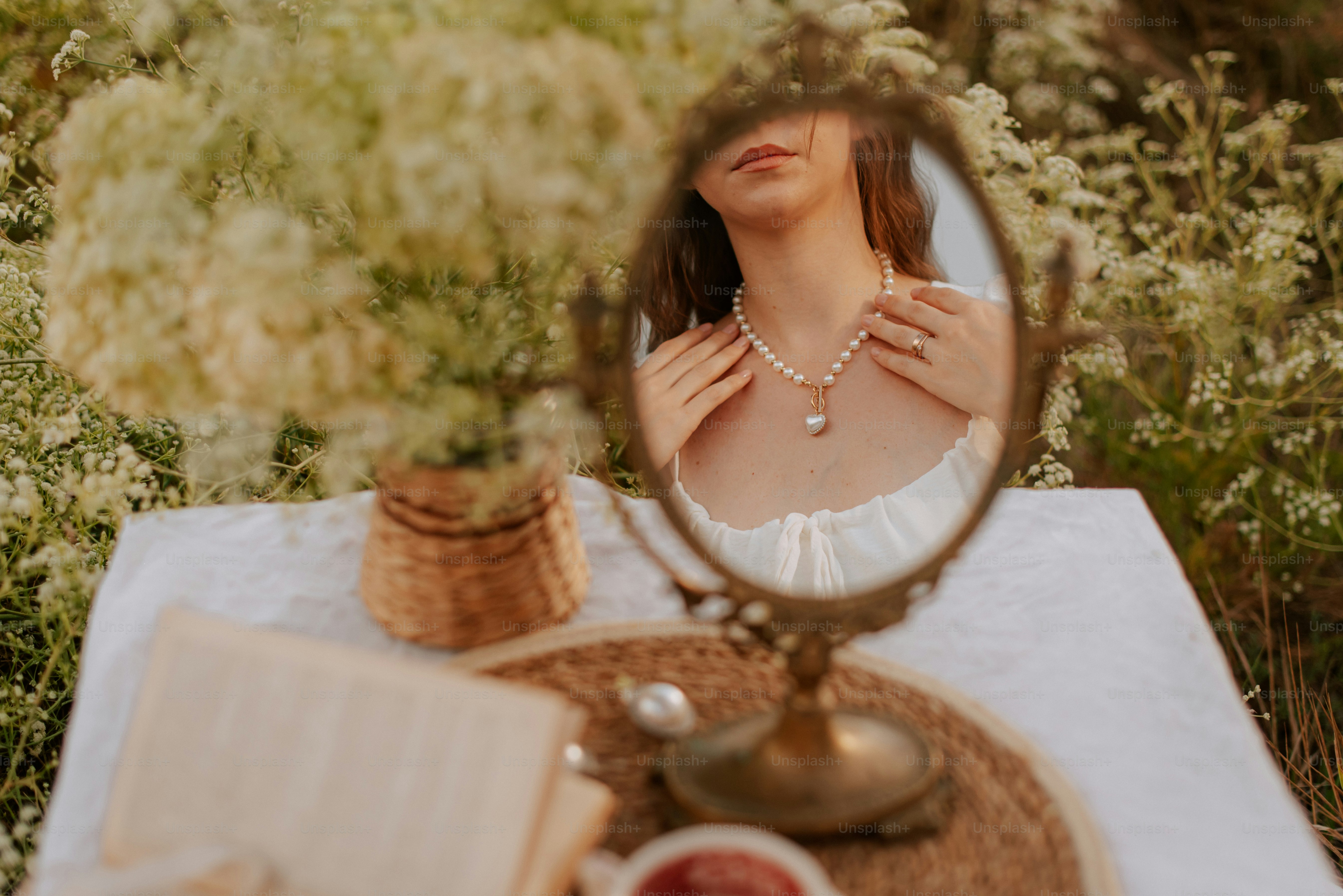 A woman looking at herself in a mirror