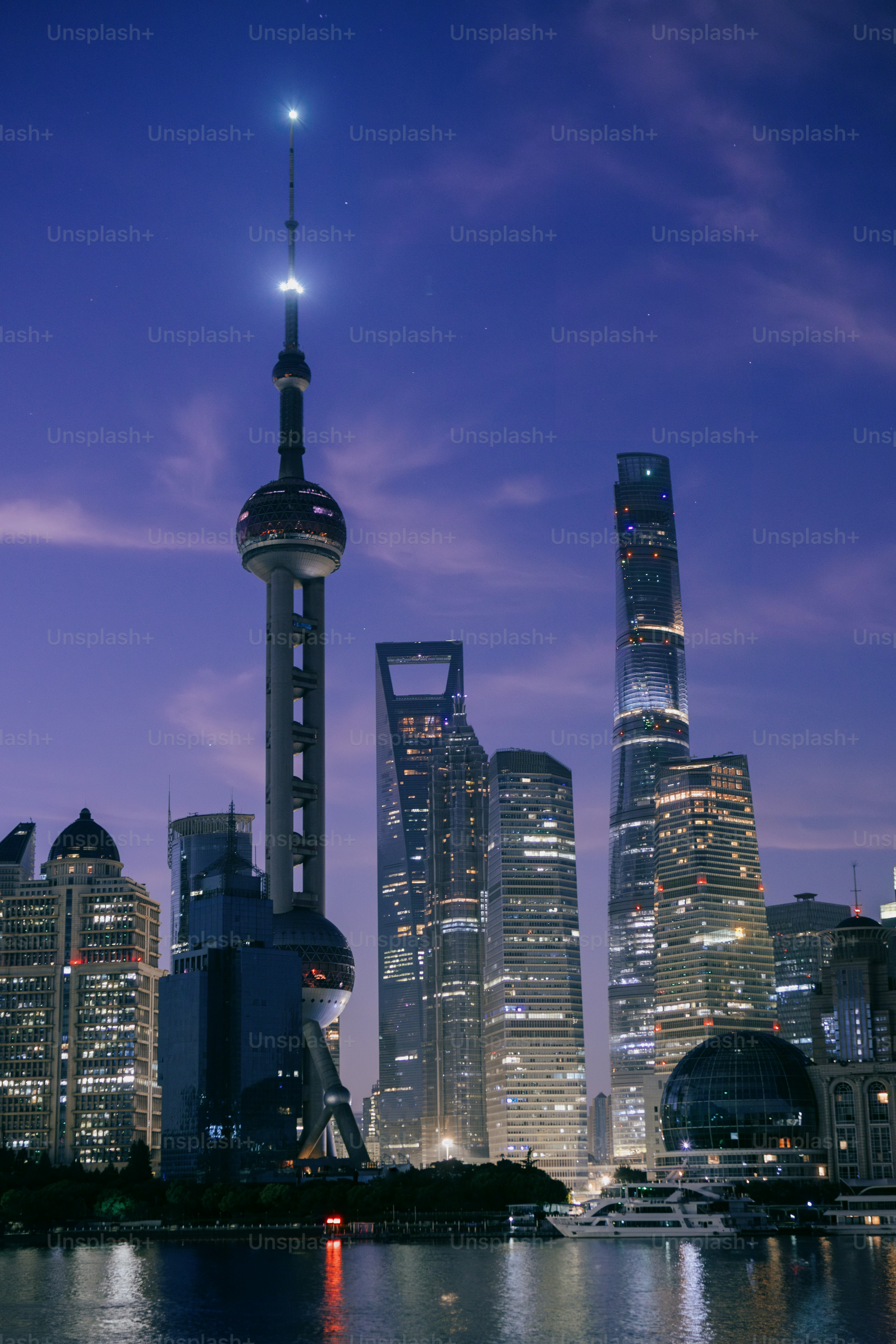 A view of a city at night from across the water