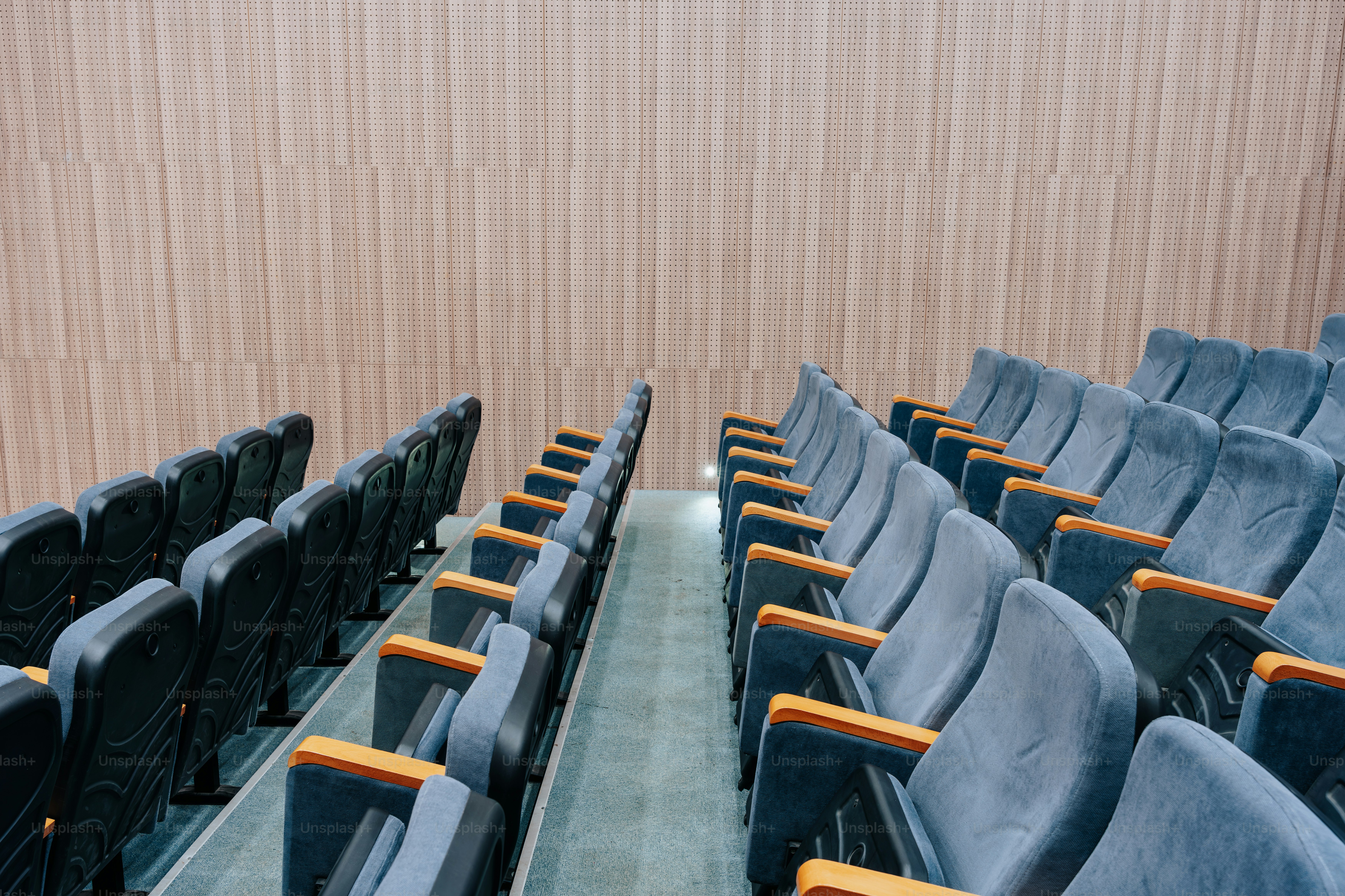 A row of empty seats in a theater
