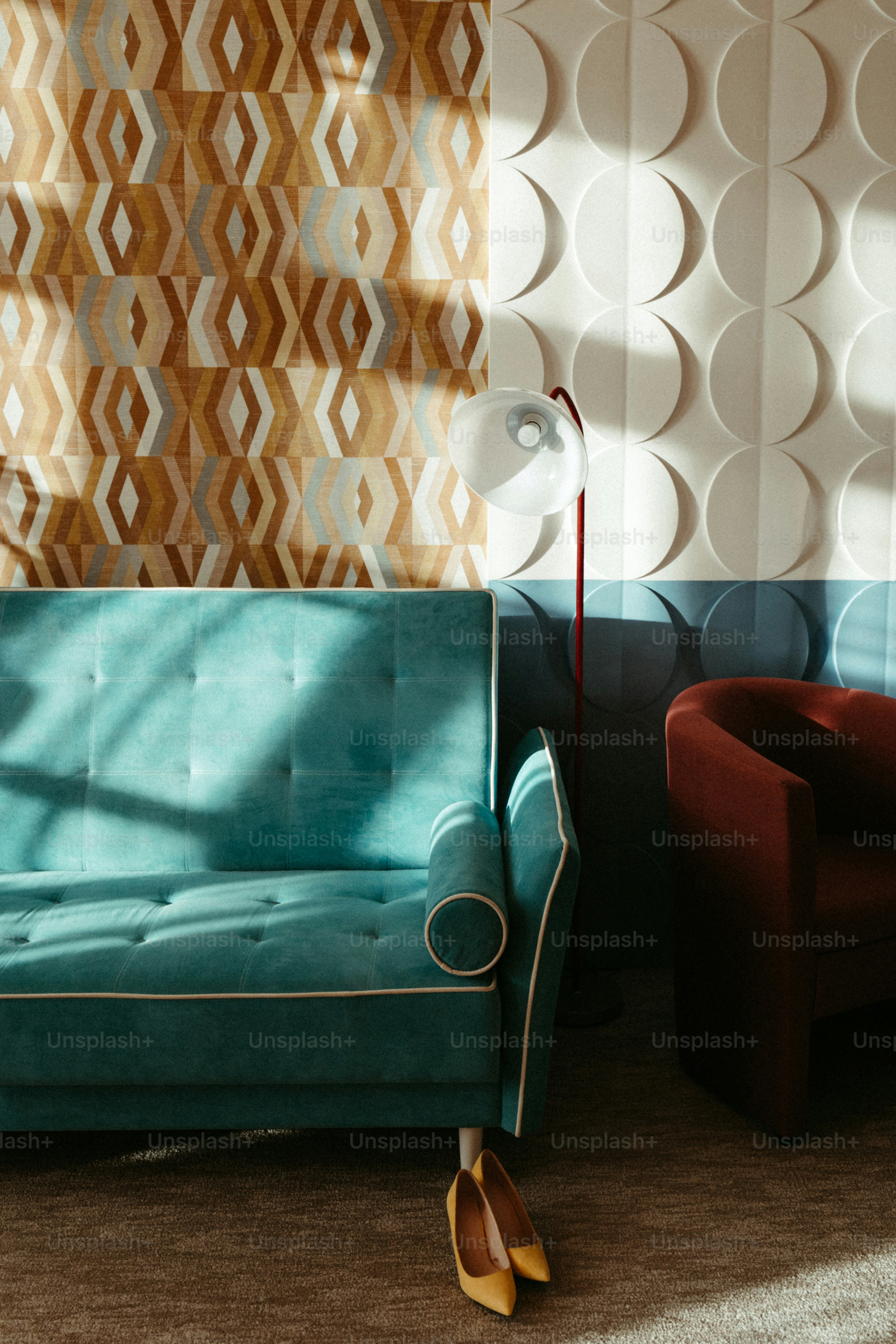 A living room with a couch and a chair