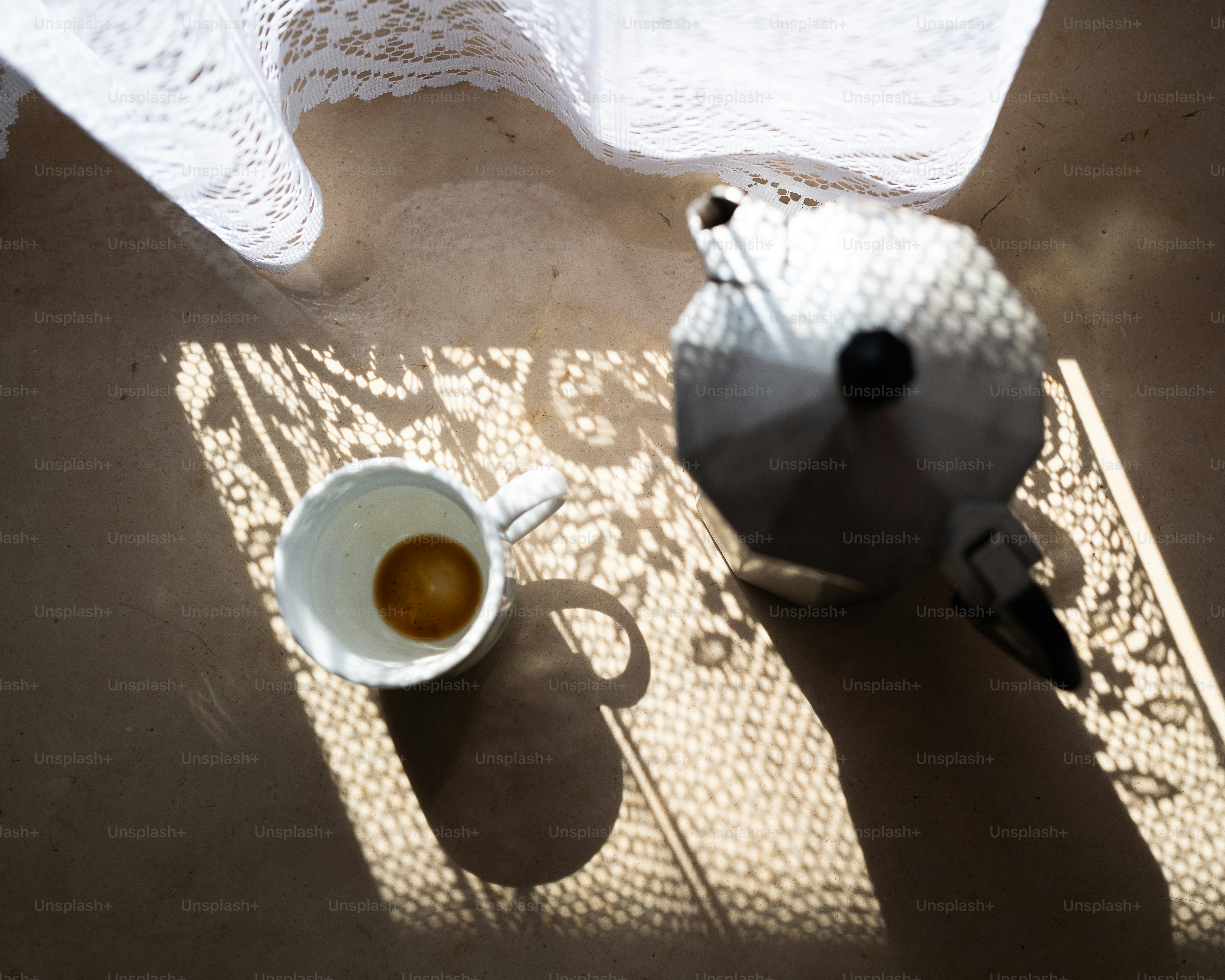 A cup of coffee sitting on top of a table