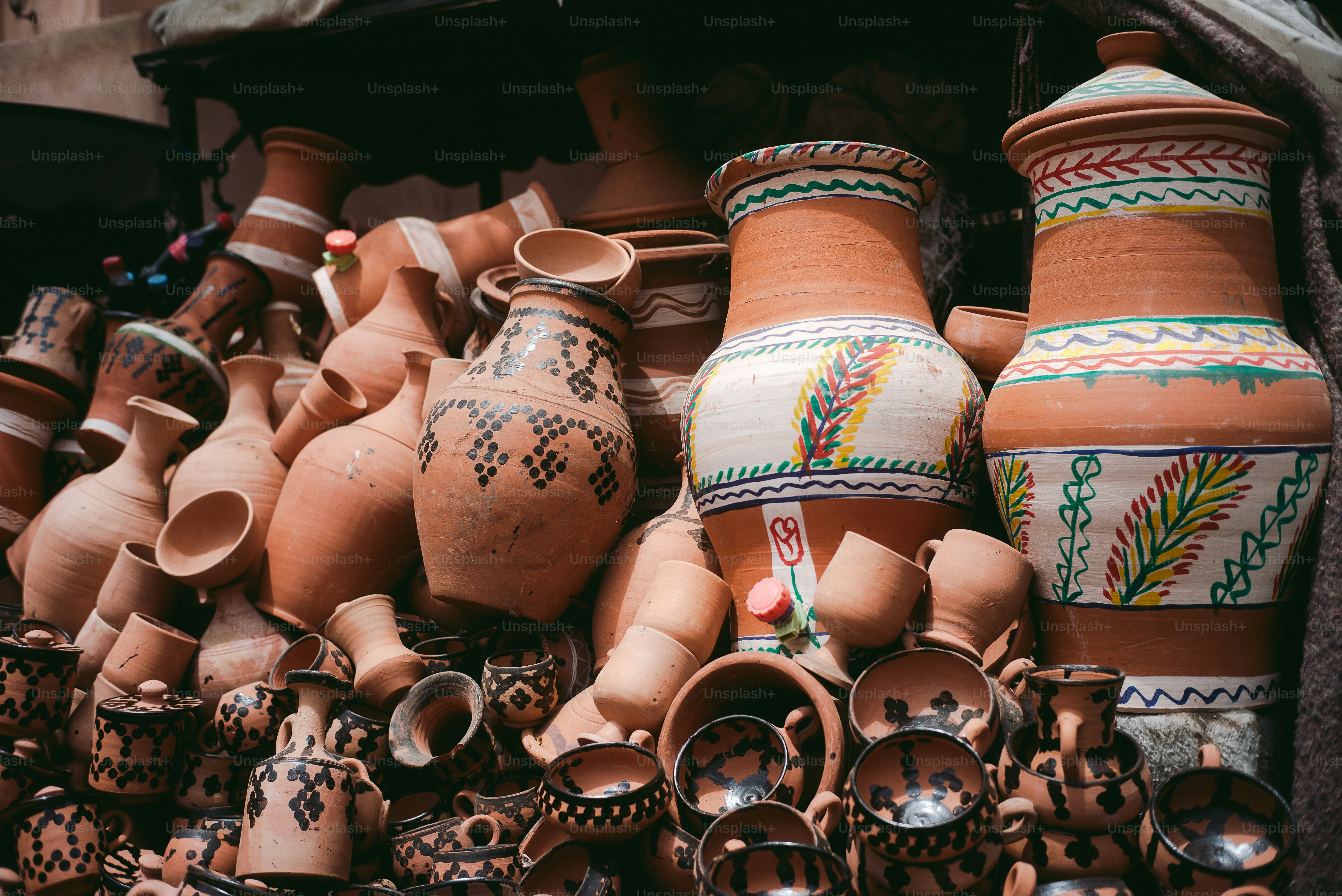 A bunch of pots that are sitting on a table