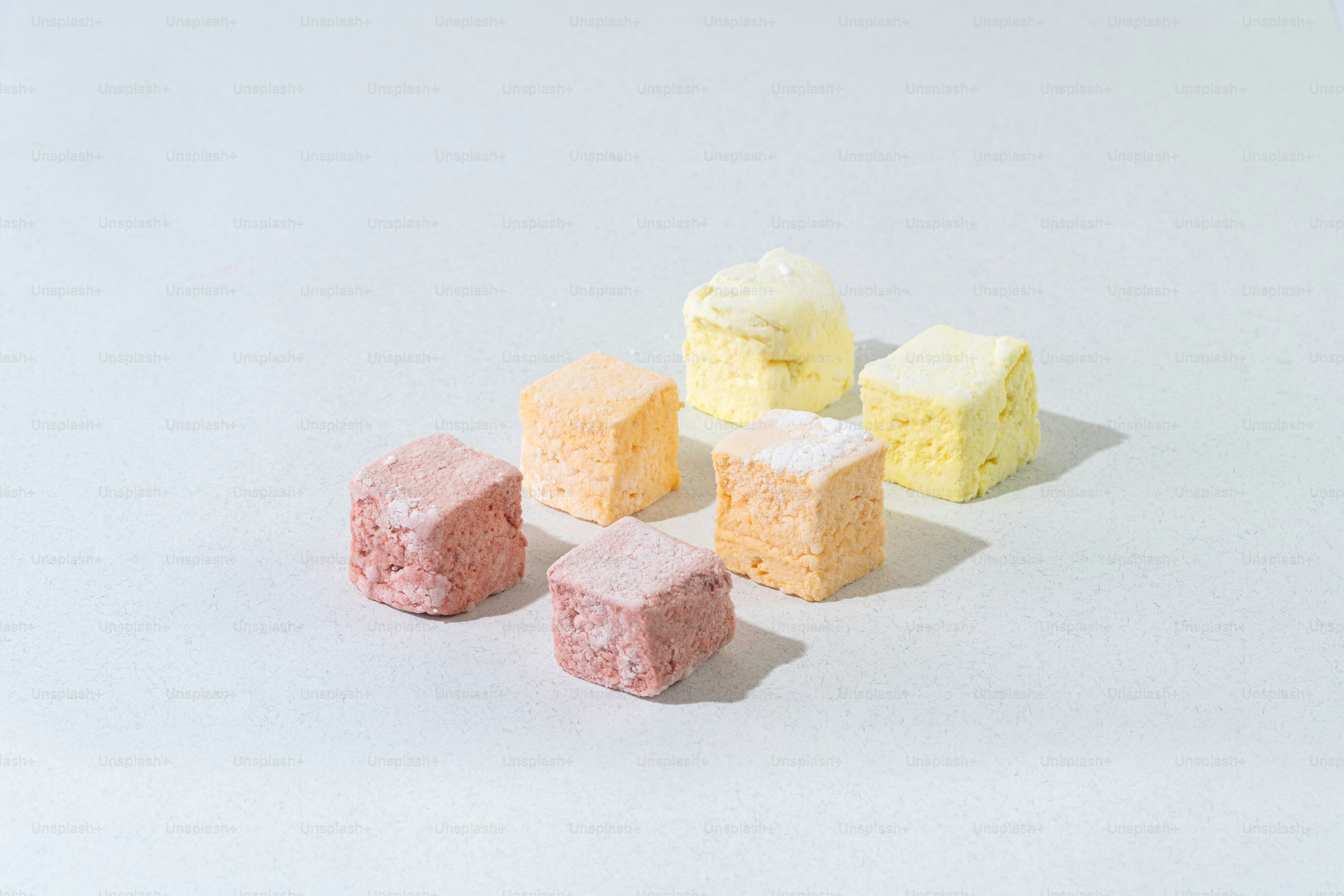 A group of marshmallows sitting next to each other