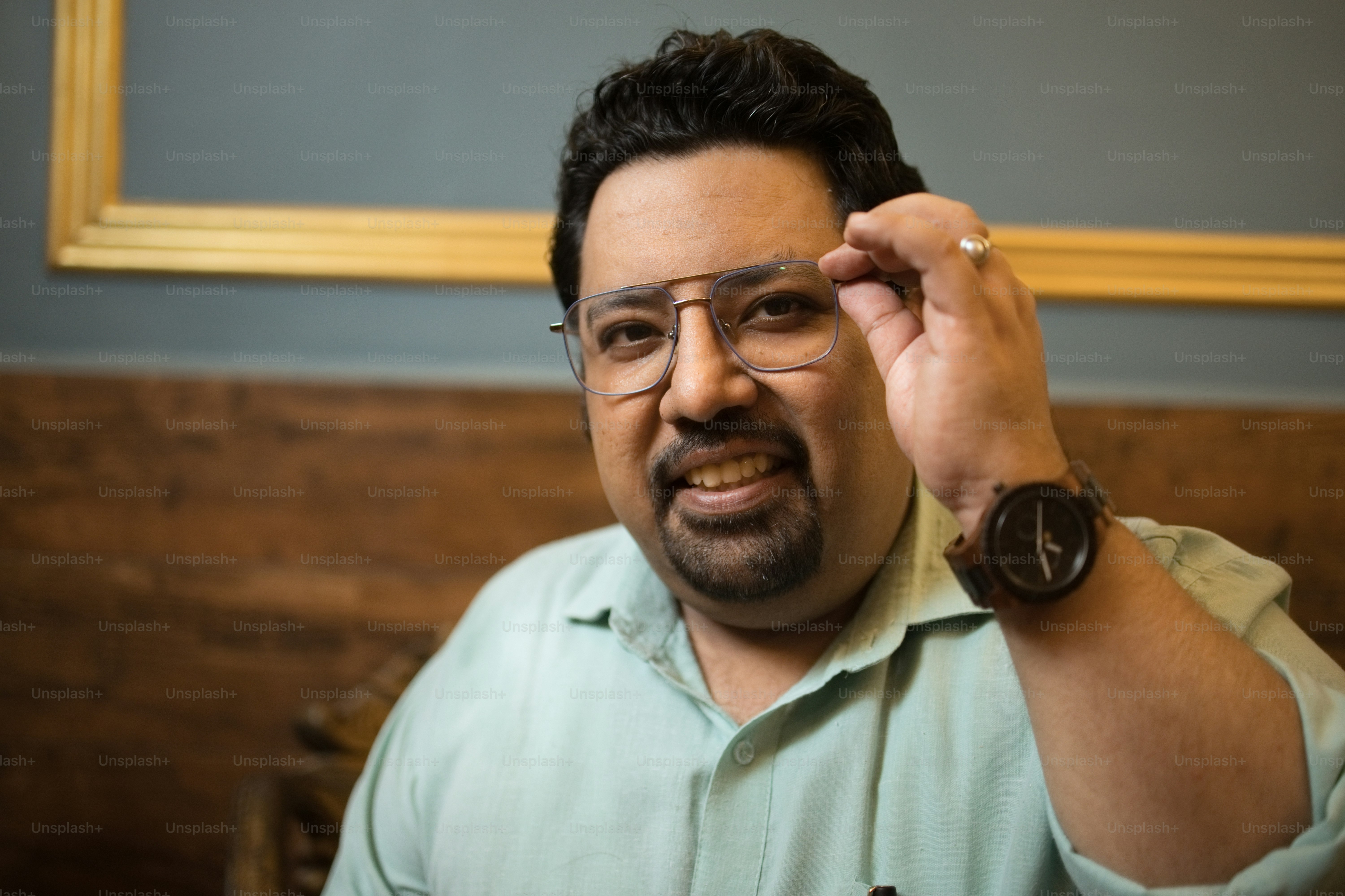 A man with a watch on his left hand