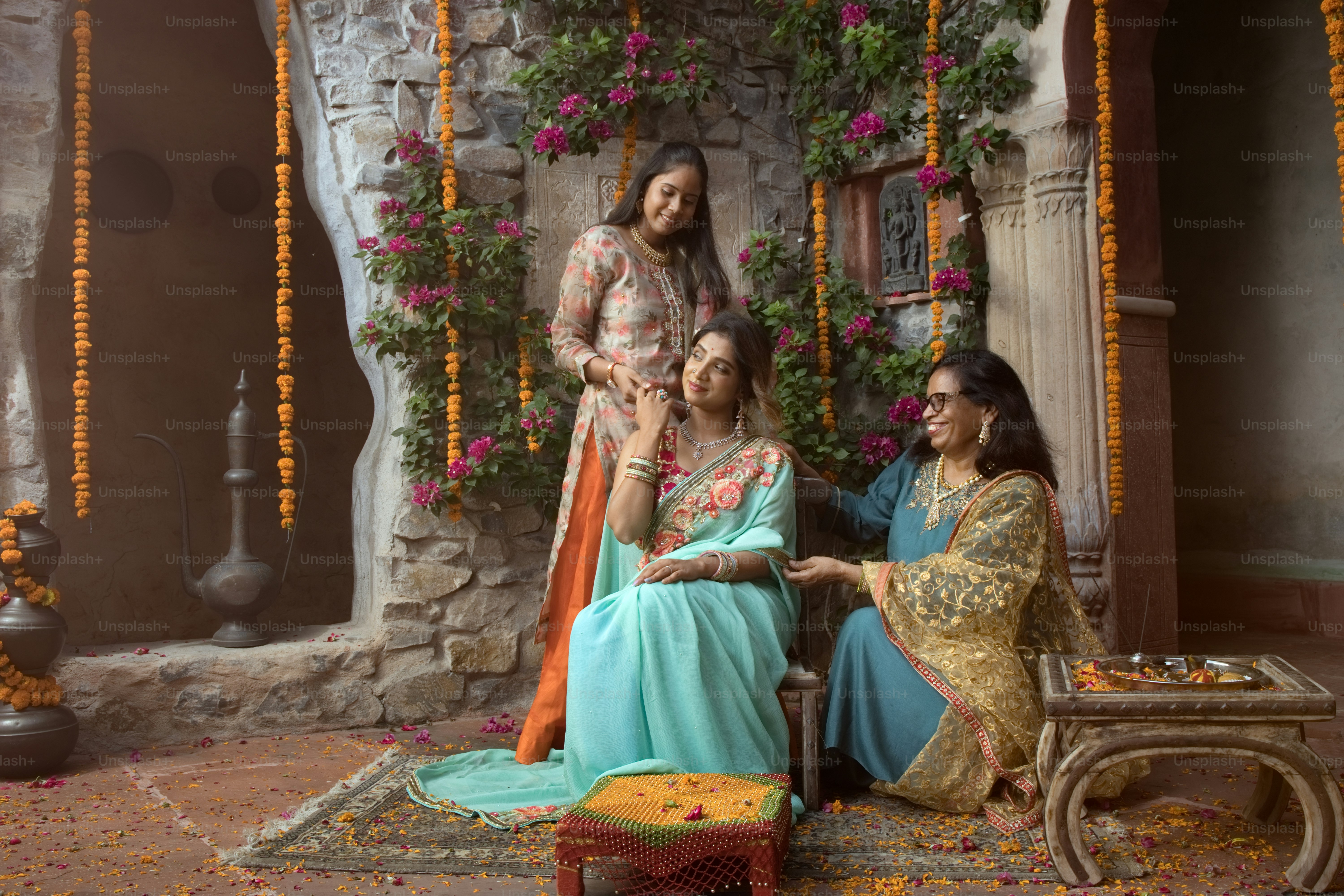 A couple of women sitting next to each other