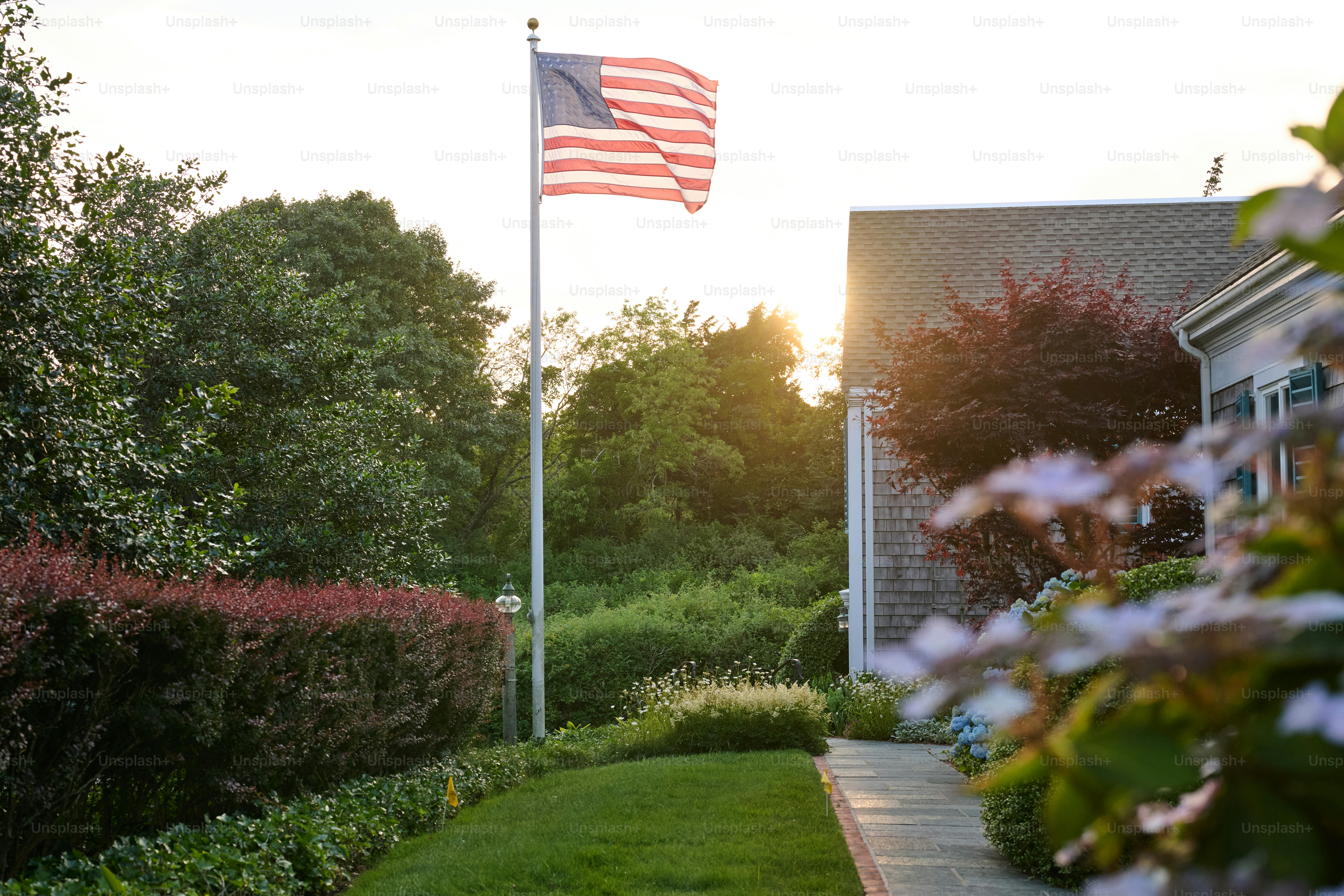 An american flag is flying in the background