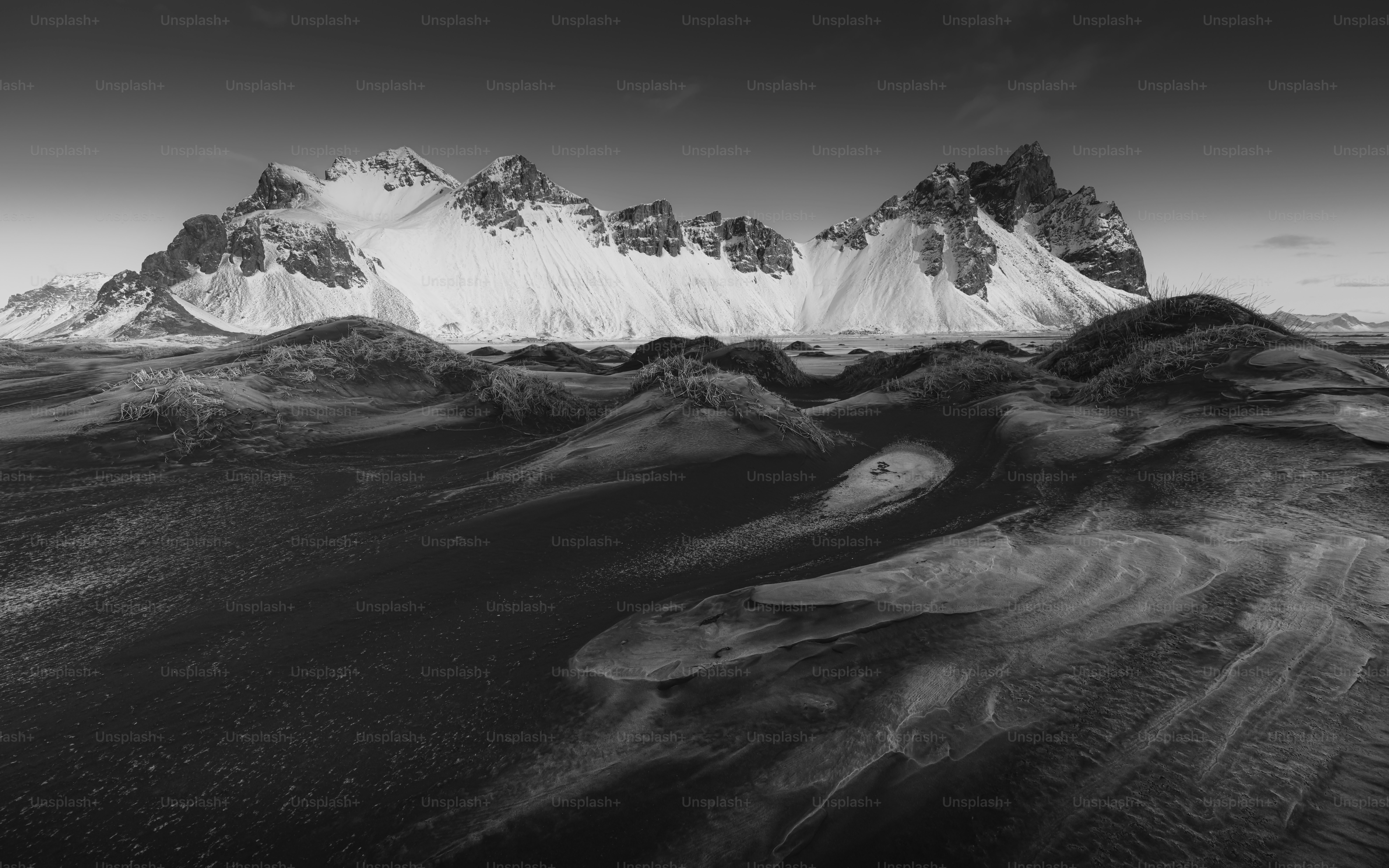 A black and white photo of a mountain range