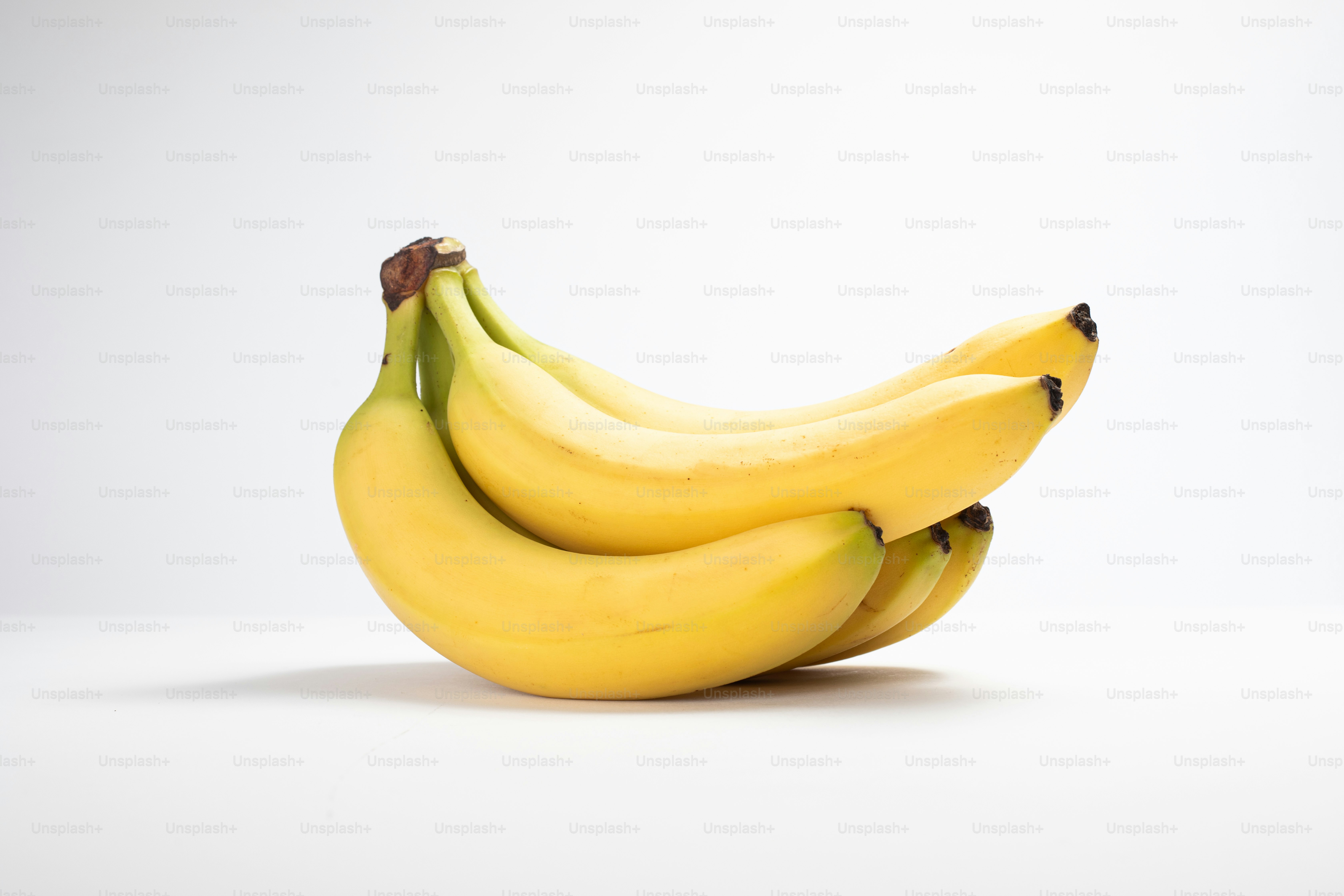 A bunch of bananas sitting on top of each other
