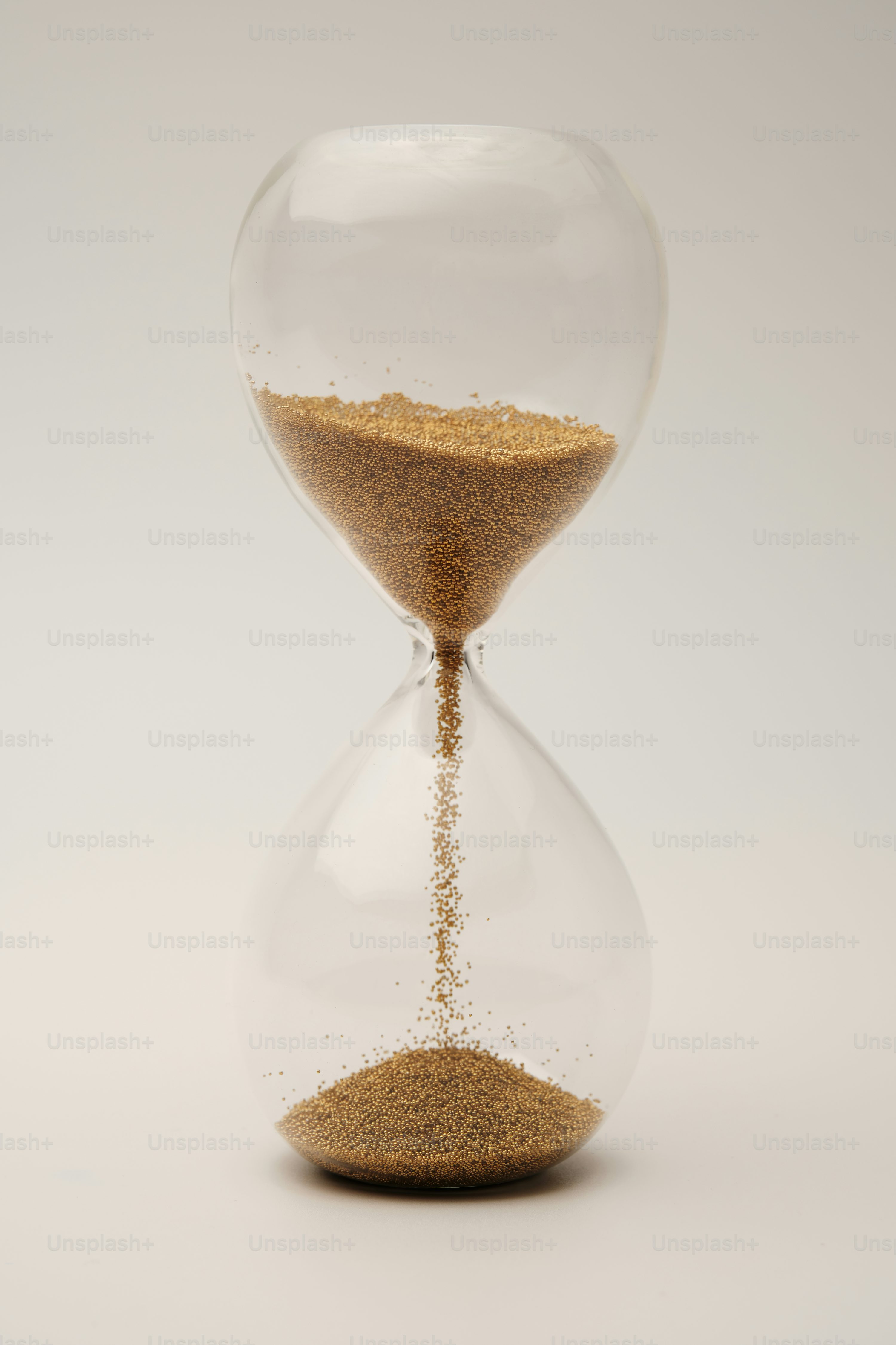 An hourglass with sand running through it