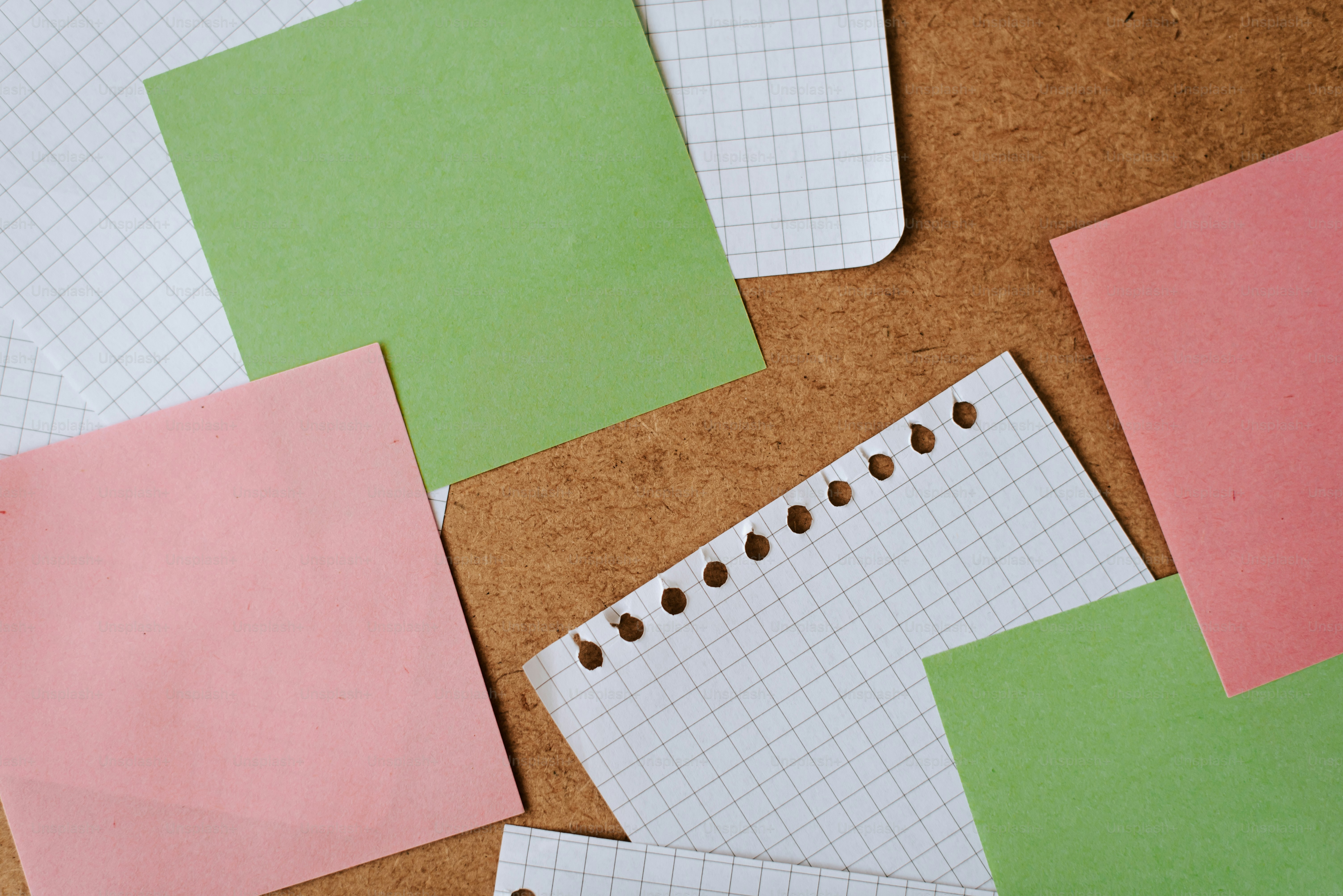 Several pieces of paper are laying on a table