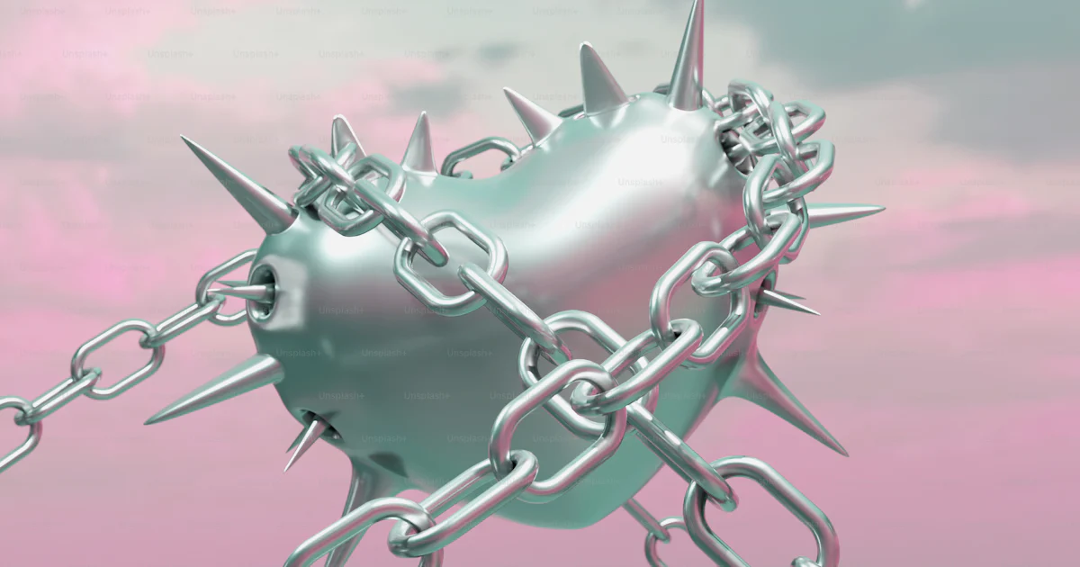 A metal chain with a heart and spikes attached to it photo – 3d Image ...