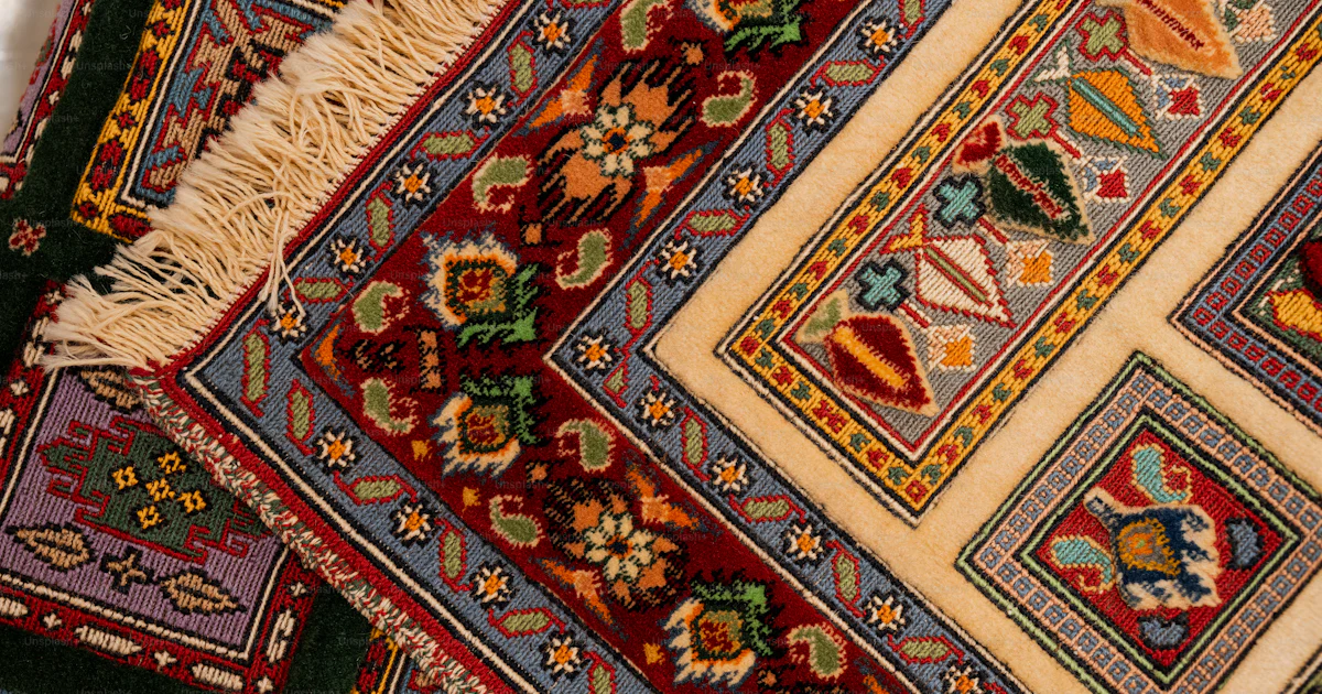 A close up of a rug with many different colors photo – Rug Image on ...