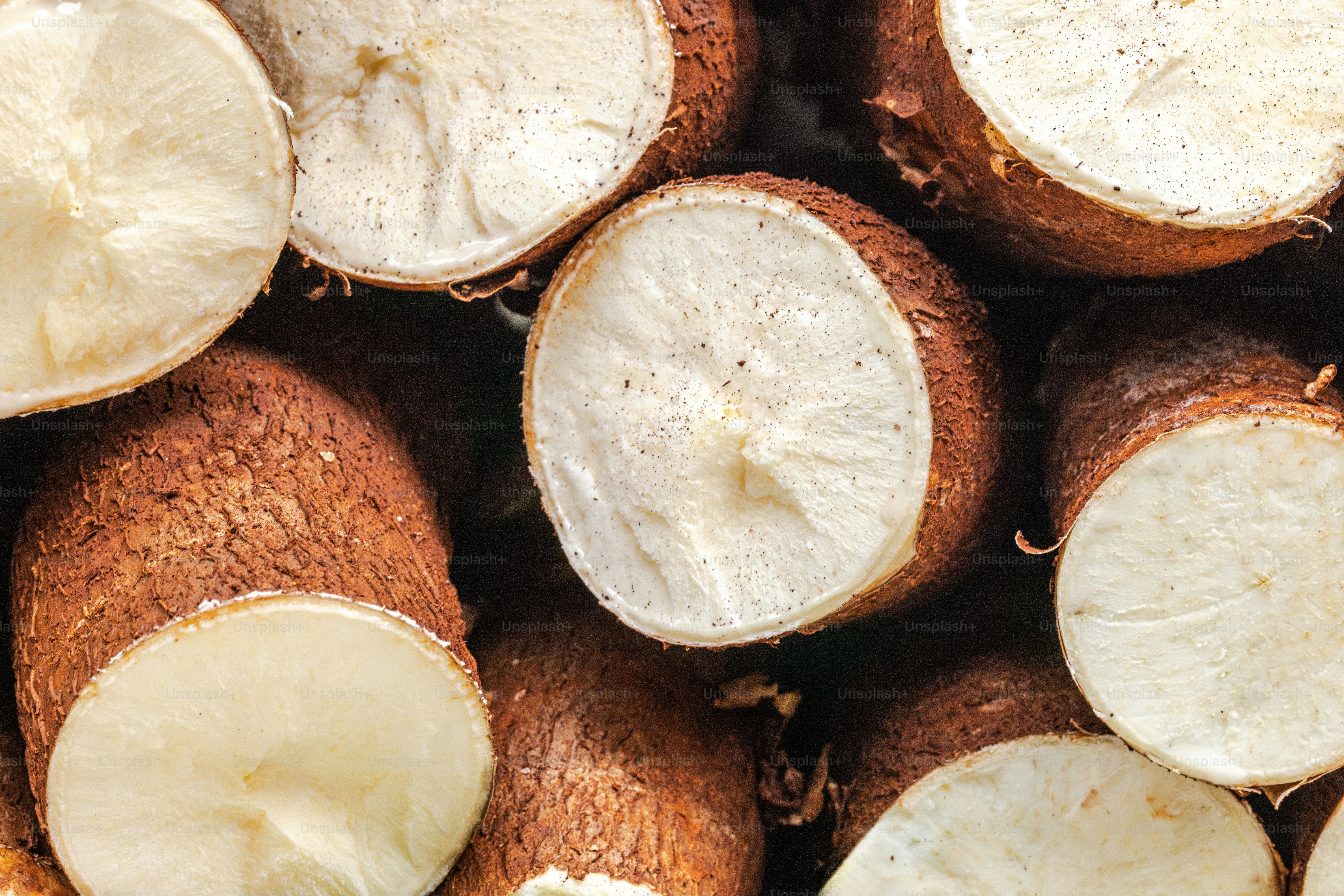 A pile of cut up bananas sitting on top of each other