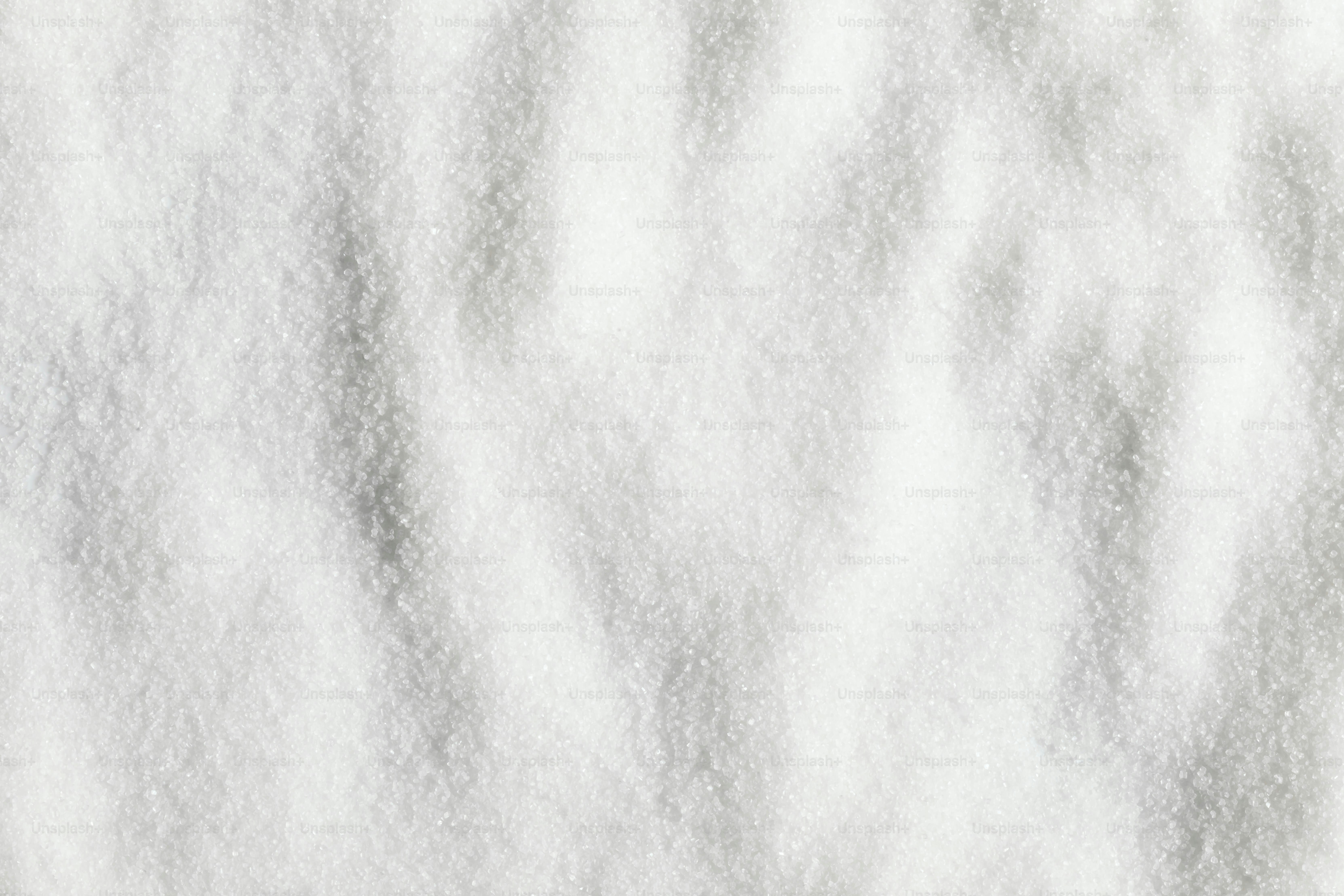 A close up of a white paper texture