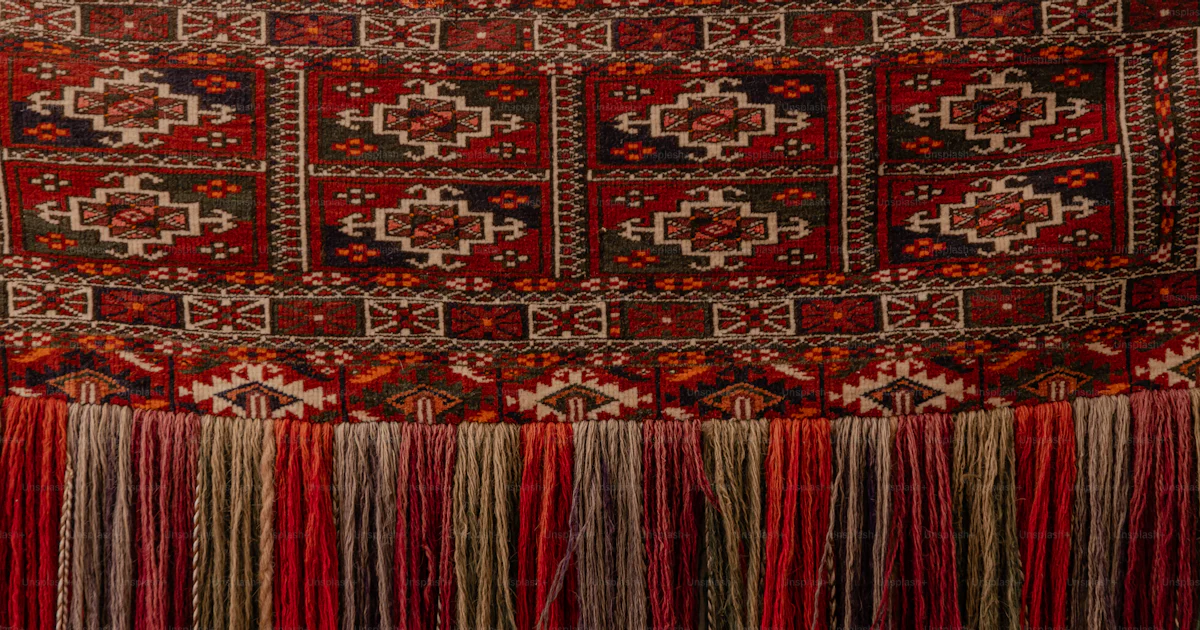 Red Rug Fringe A close up of a red rug with fringes photo – Patterns Image on Unsplash
