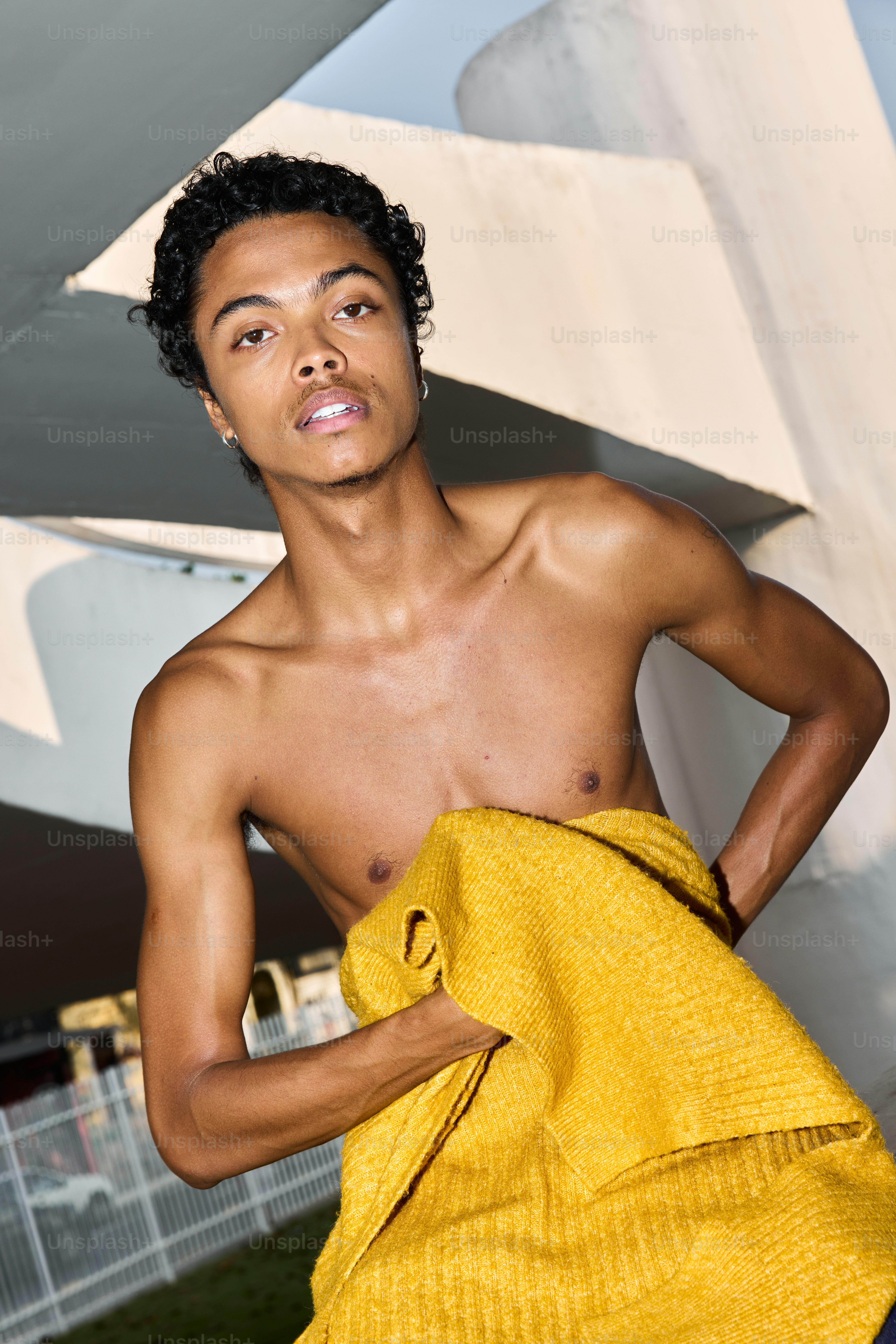 A man with a towel on his shoulder