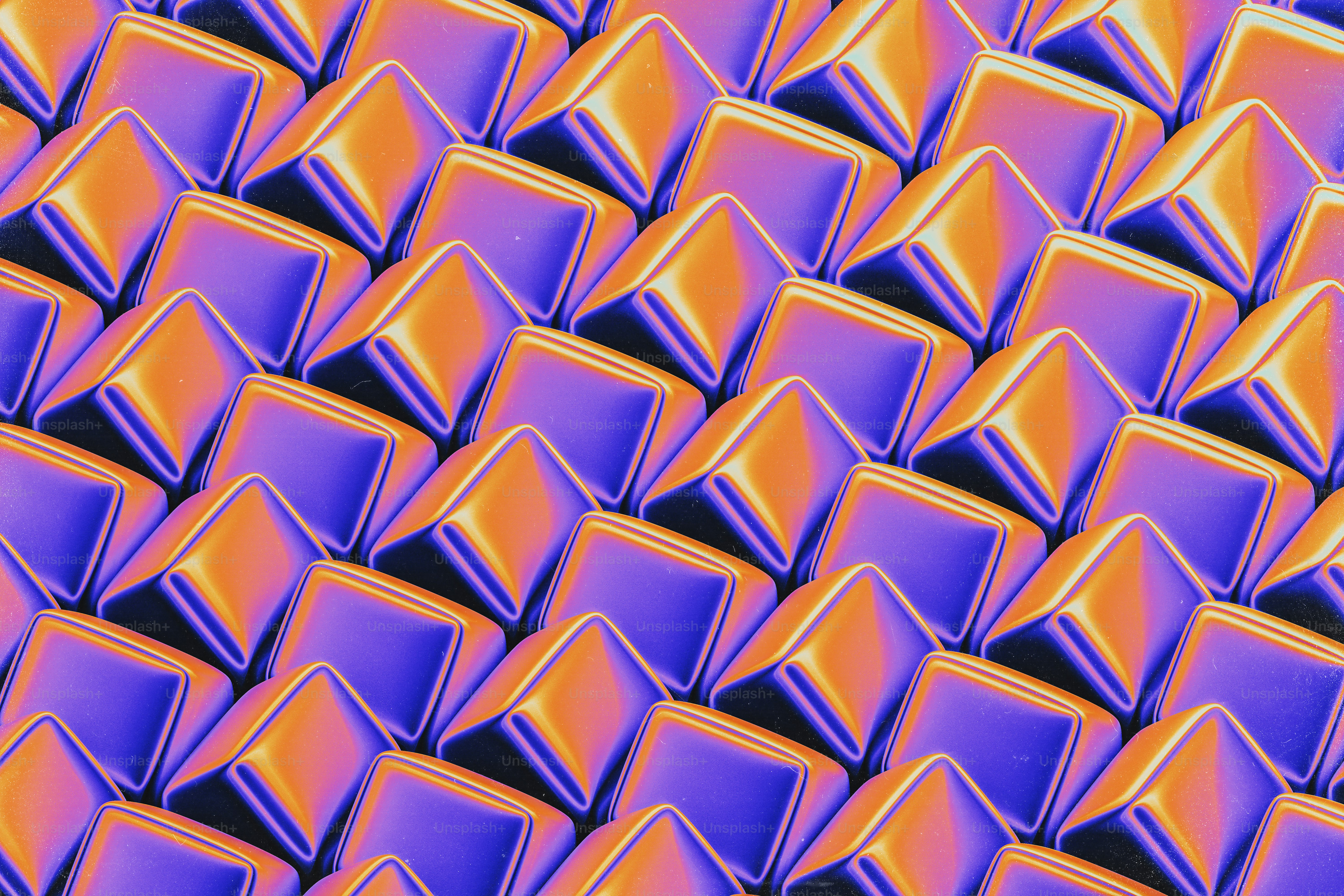 Un primer plano de un patrón morado y naranja