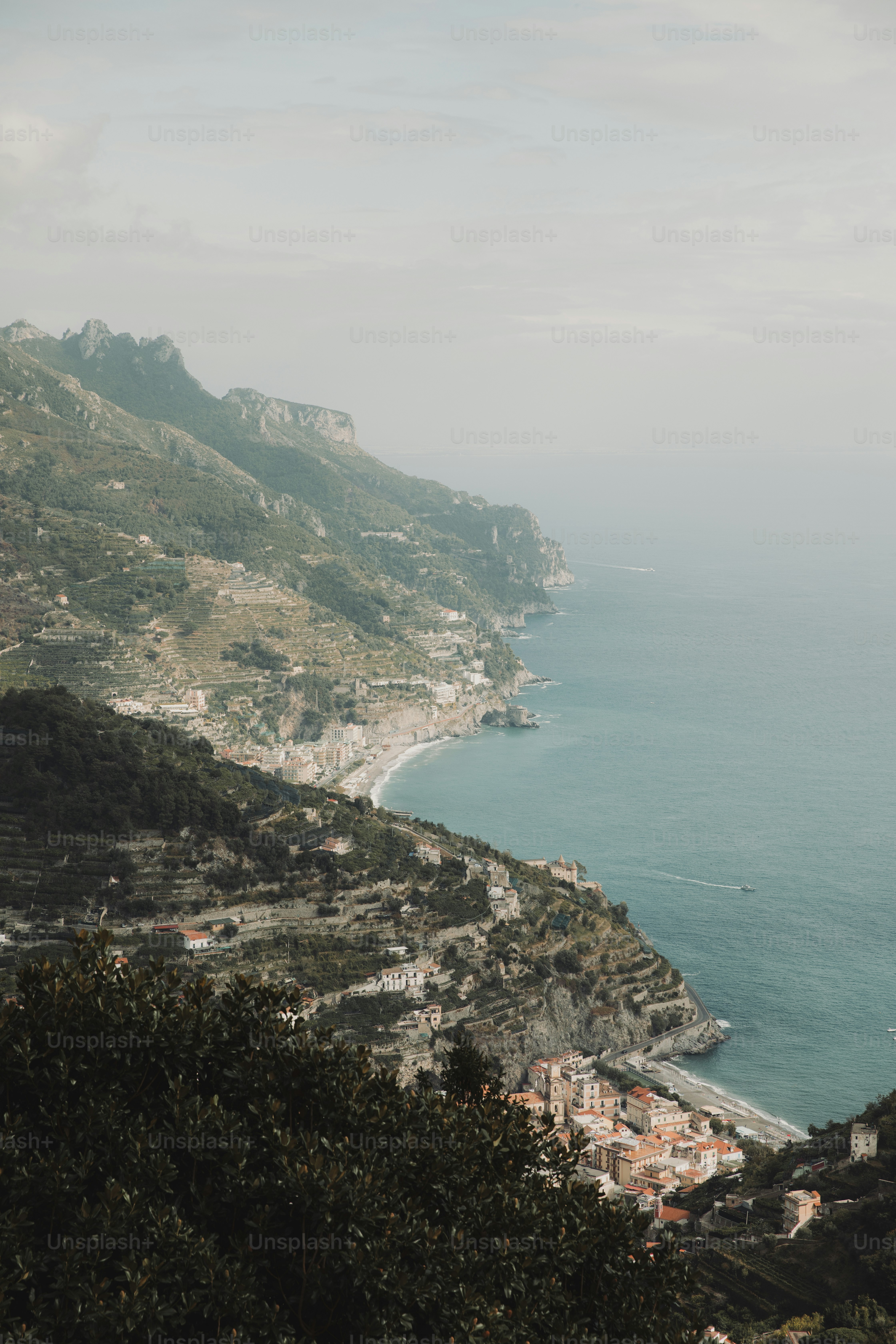 A scenic view of the ocean from a hill photo – Architecture Image on ...