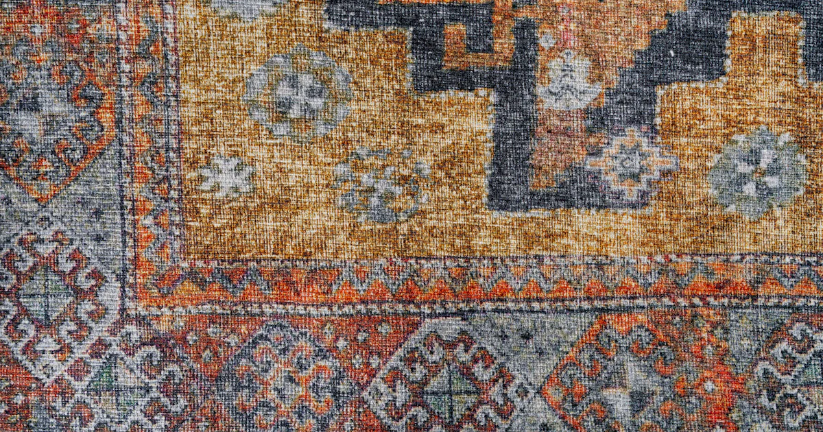 Plus Sign Cross Rugs A close up of a rug with a cross on it photo – Carpet Image on Unsplash