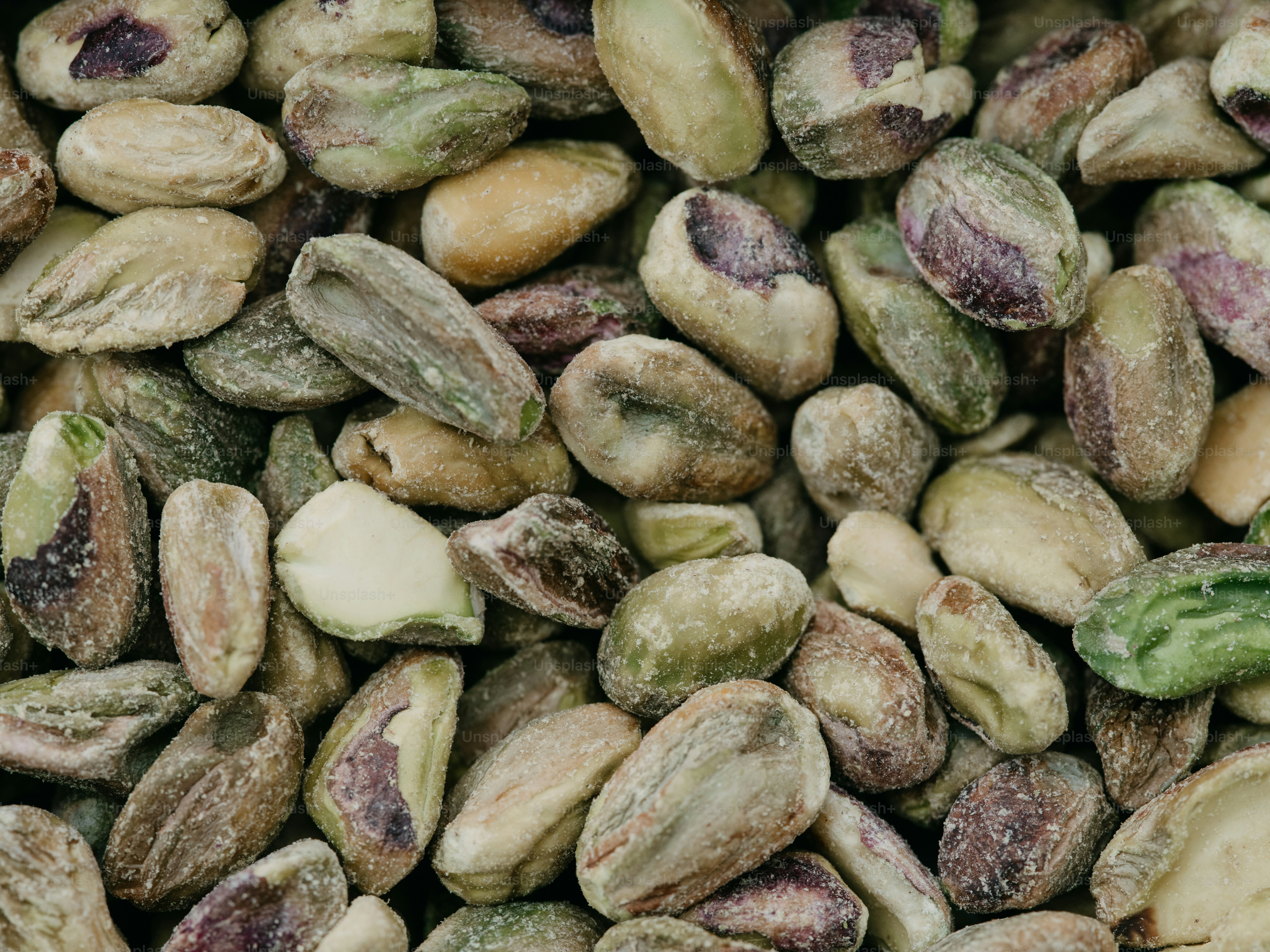 A pile of nuts sitting next to each other