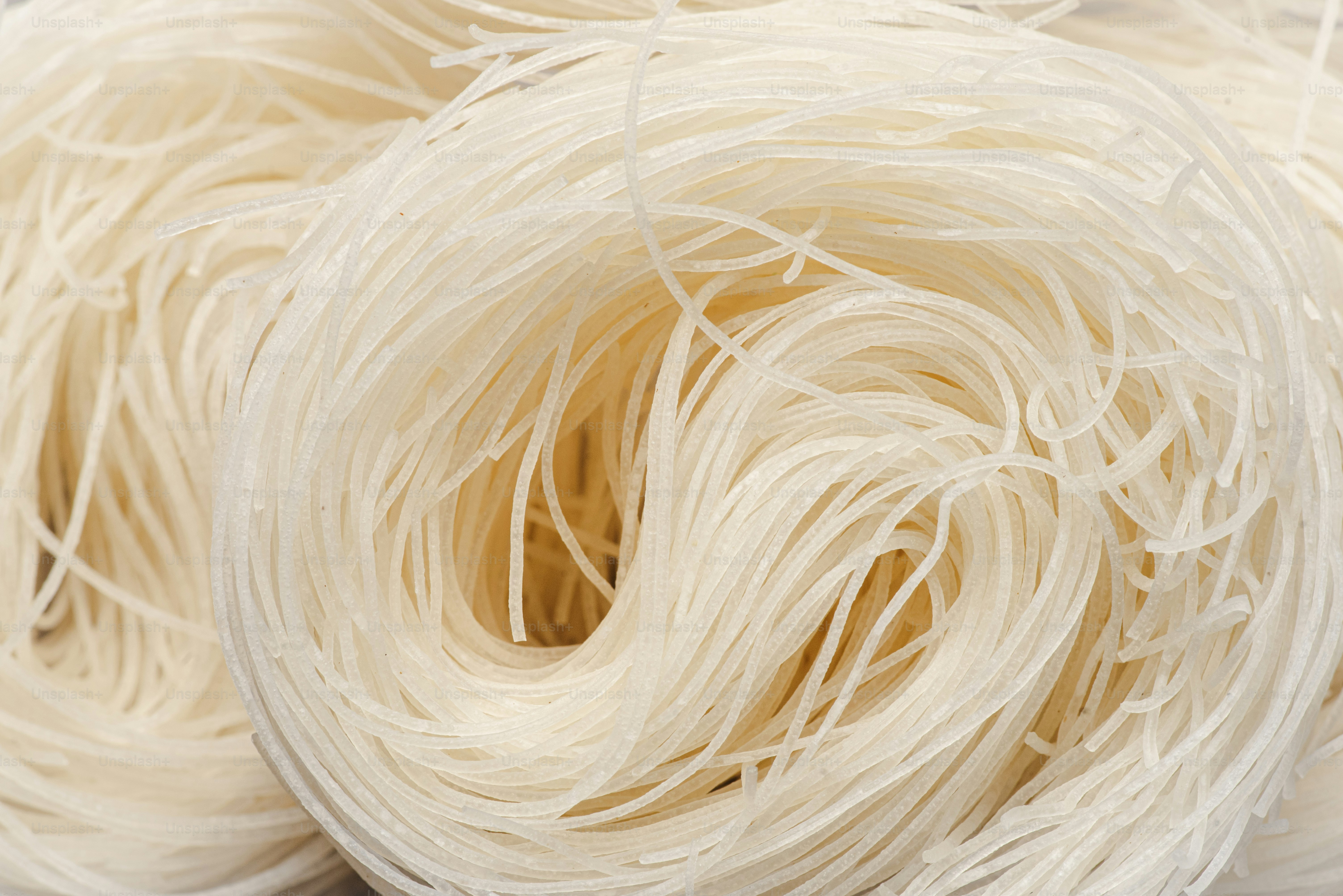A white ball of yarn sitting on top of a table
