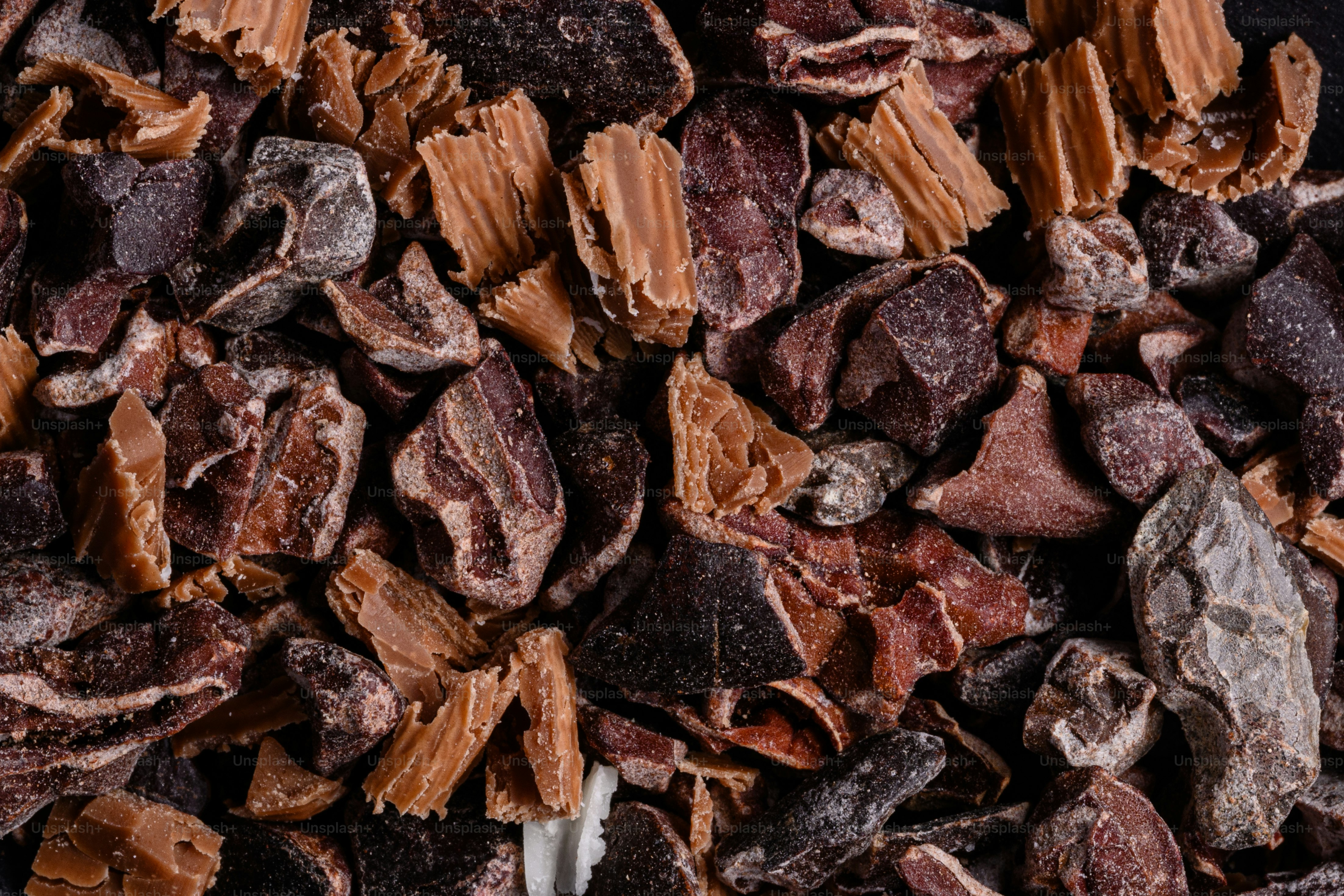 A close up of a spoon in a pile of food