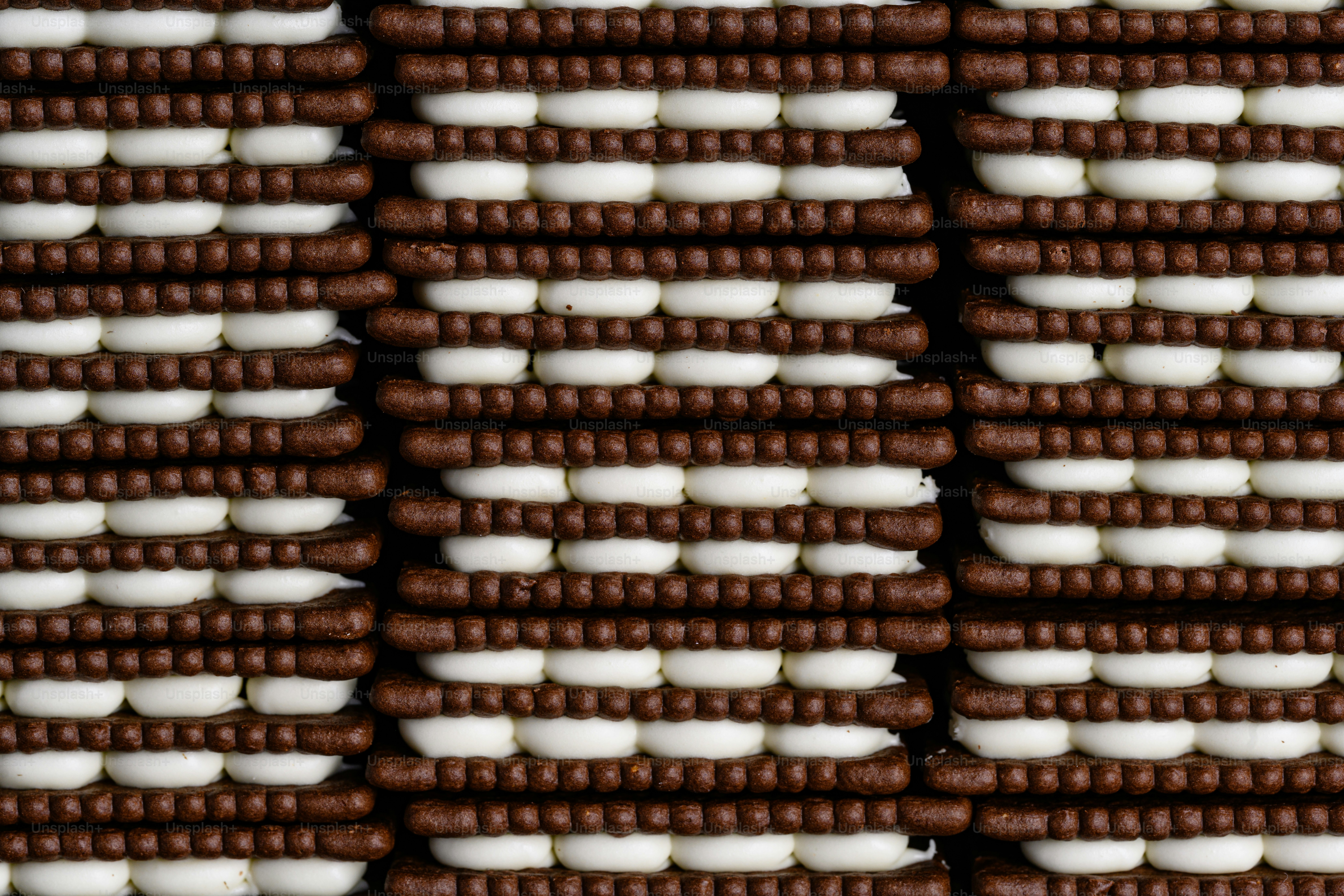 A close up of a brown and white wall