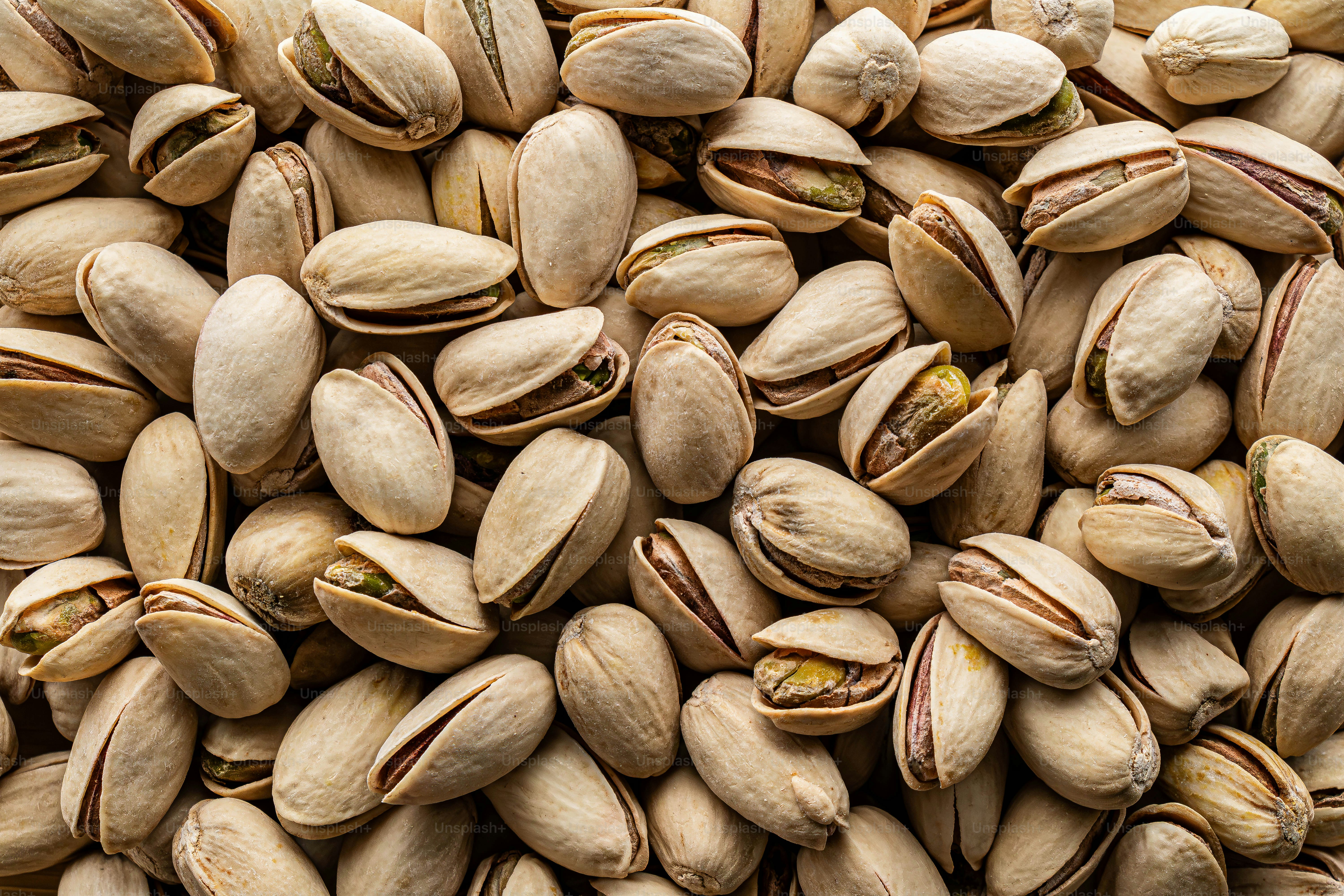 A close up of a pile of nuts