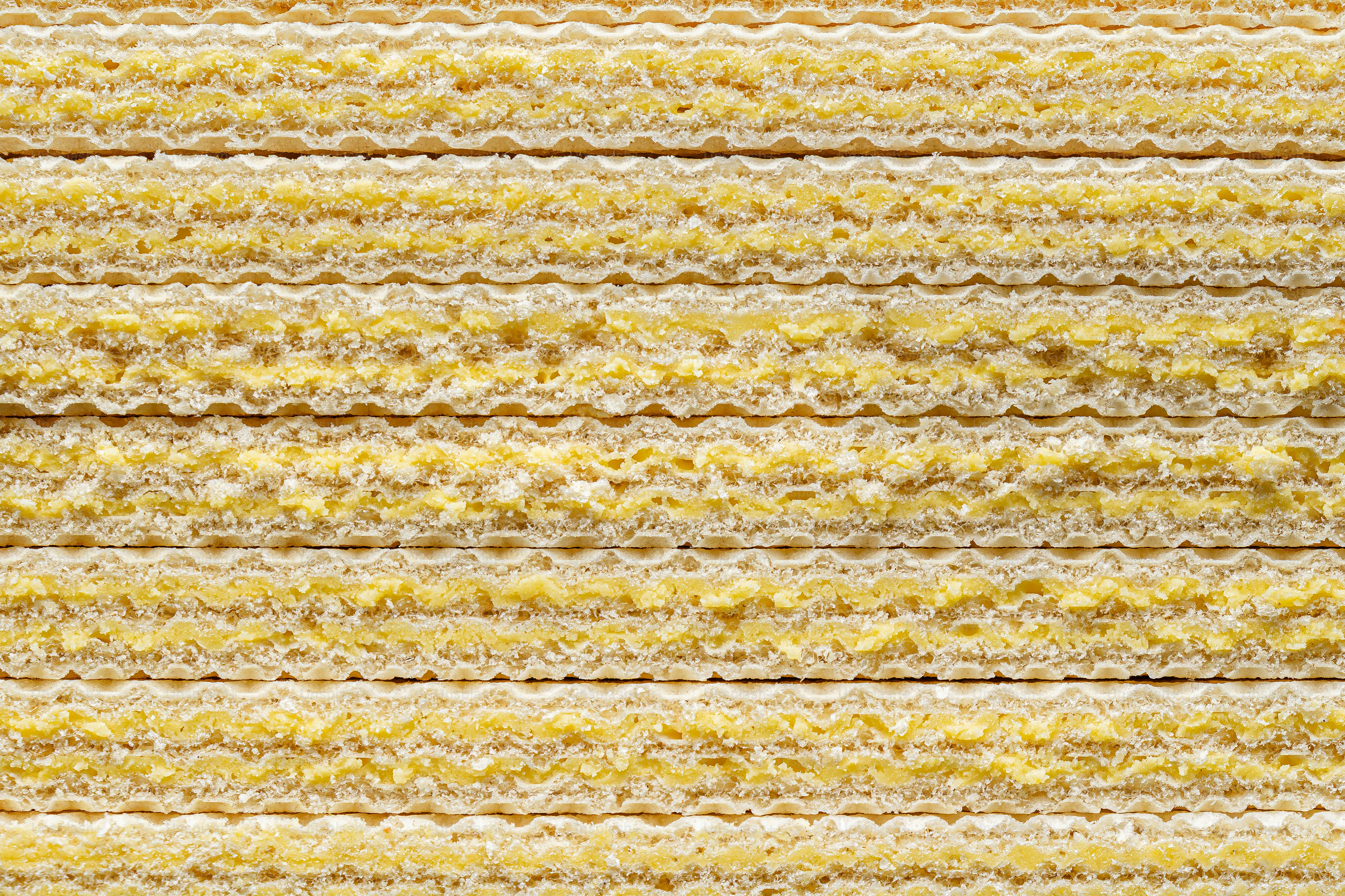 Nahaufnahme eines gelb-weiß gestreiften Stoffes