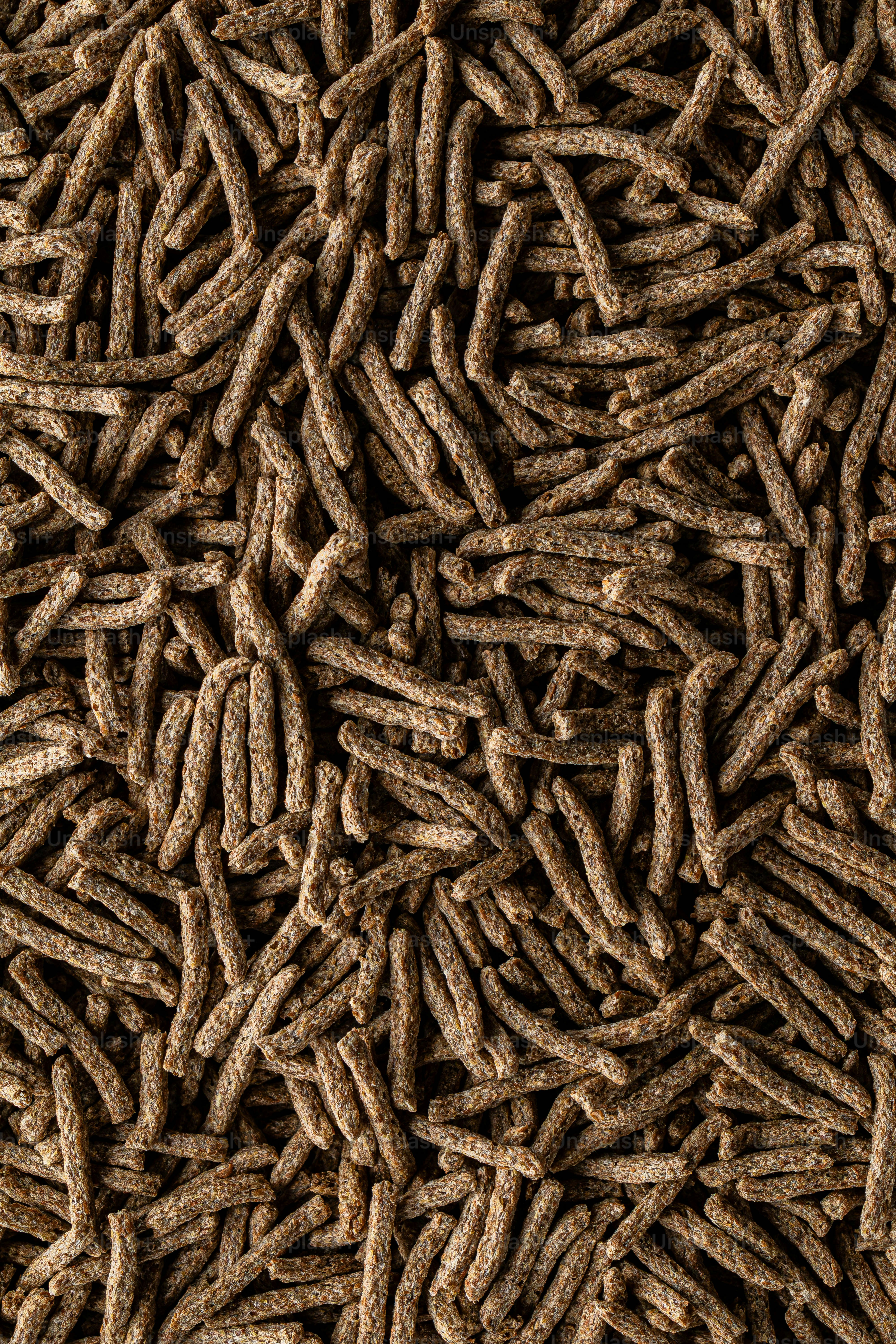 A pile of dog food that is brown