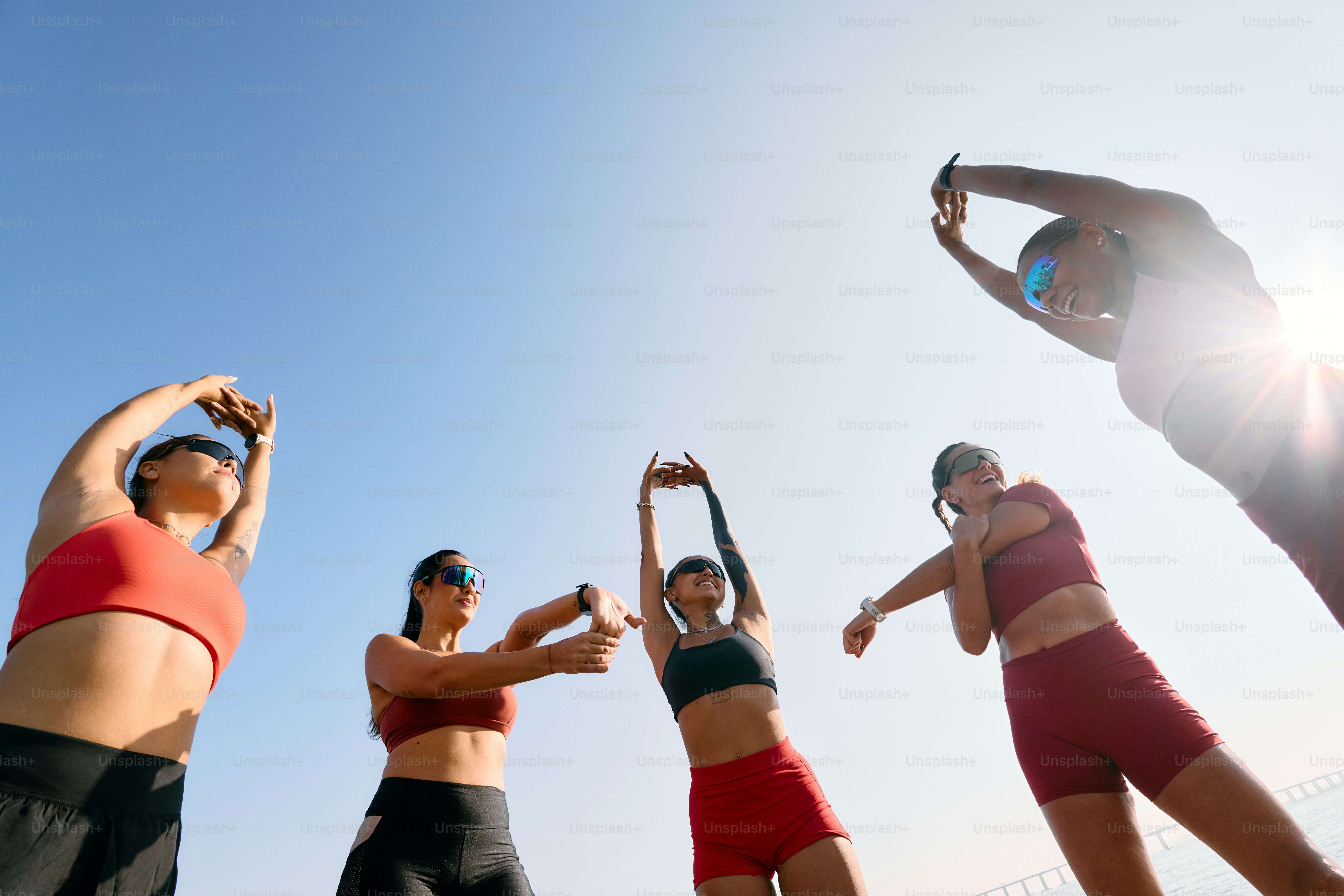 A group of people standing around each other