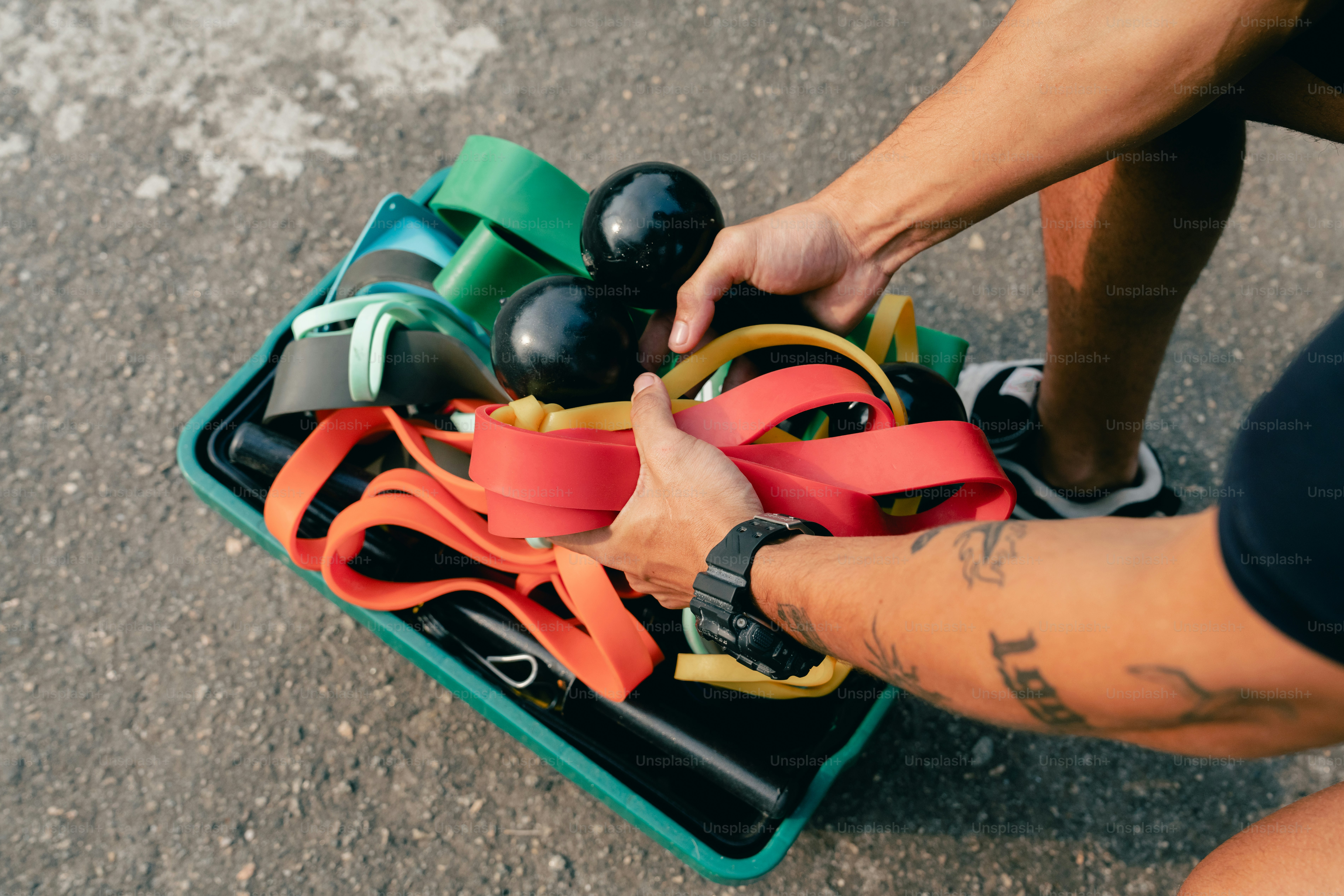 A person is tying a pair of shoes