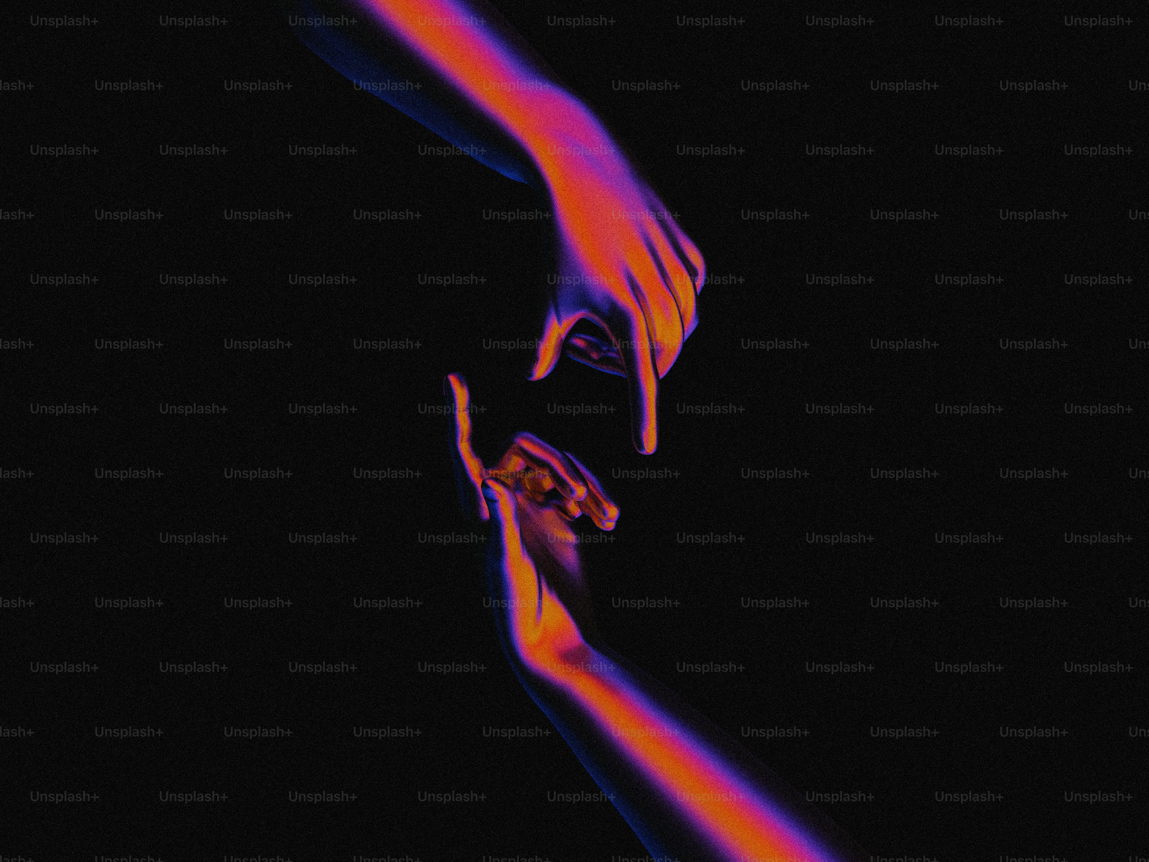 A hand reaching for something in the dark