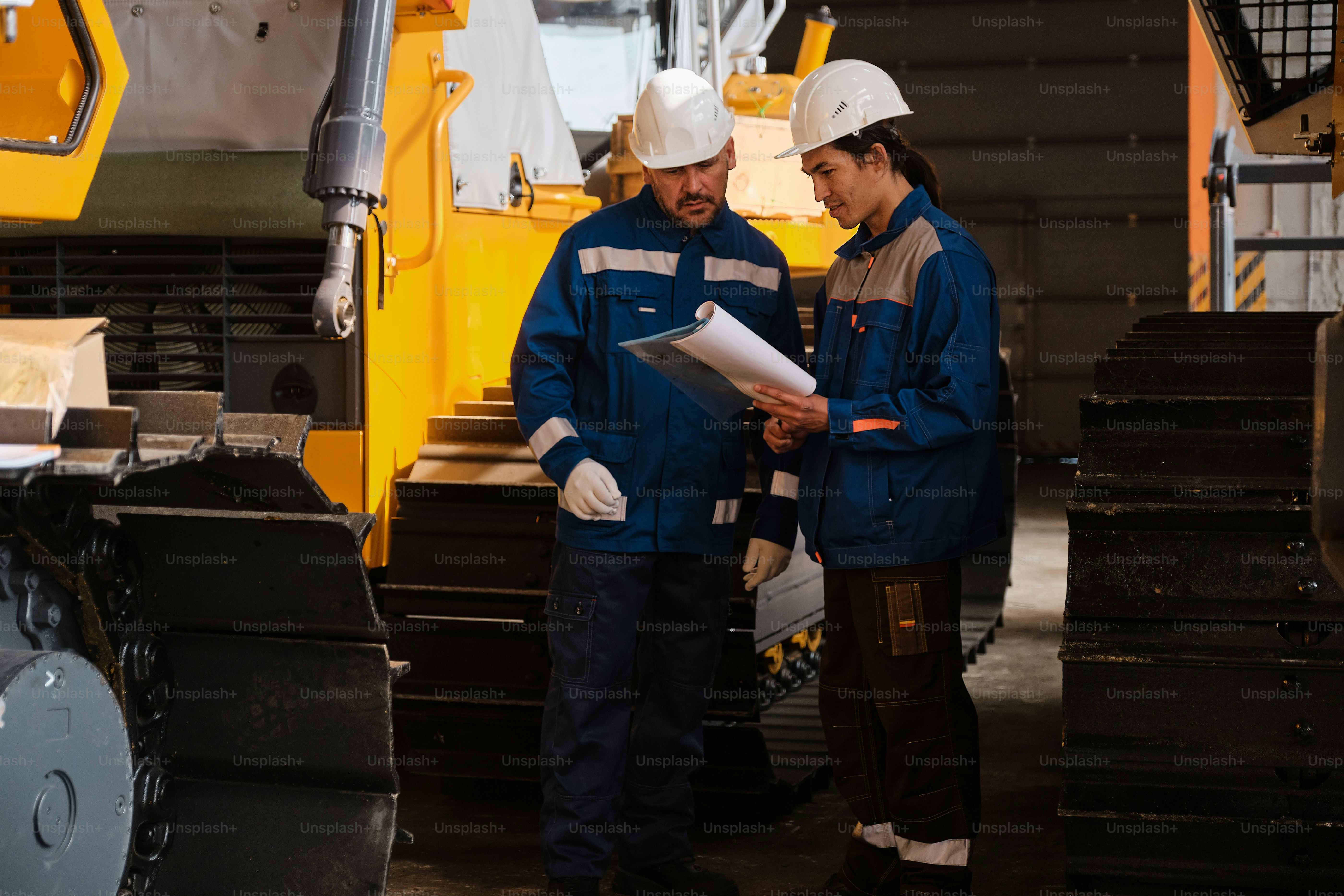 A couple of men standing next to each other