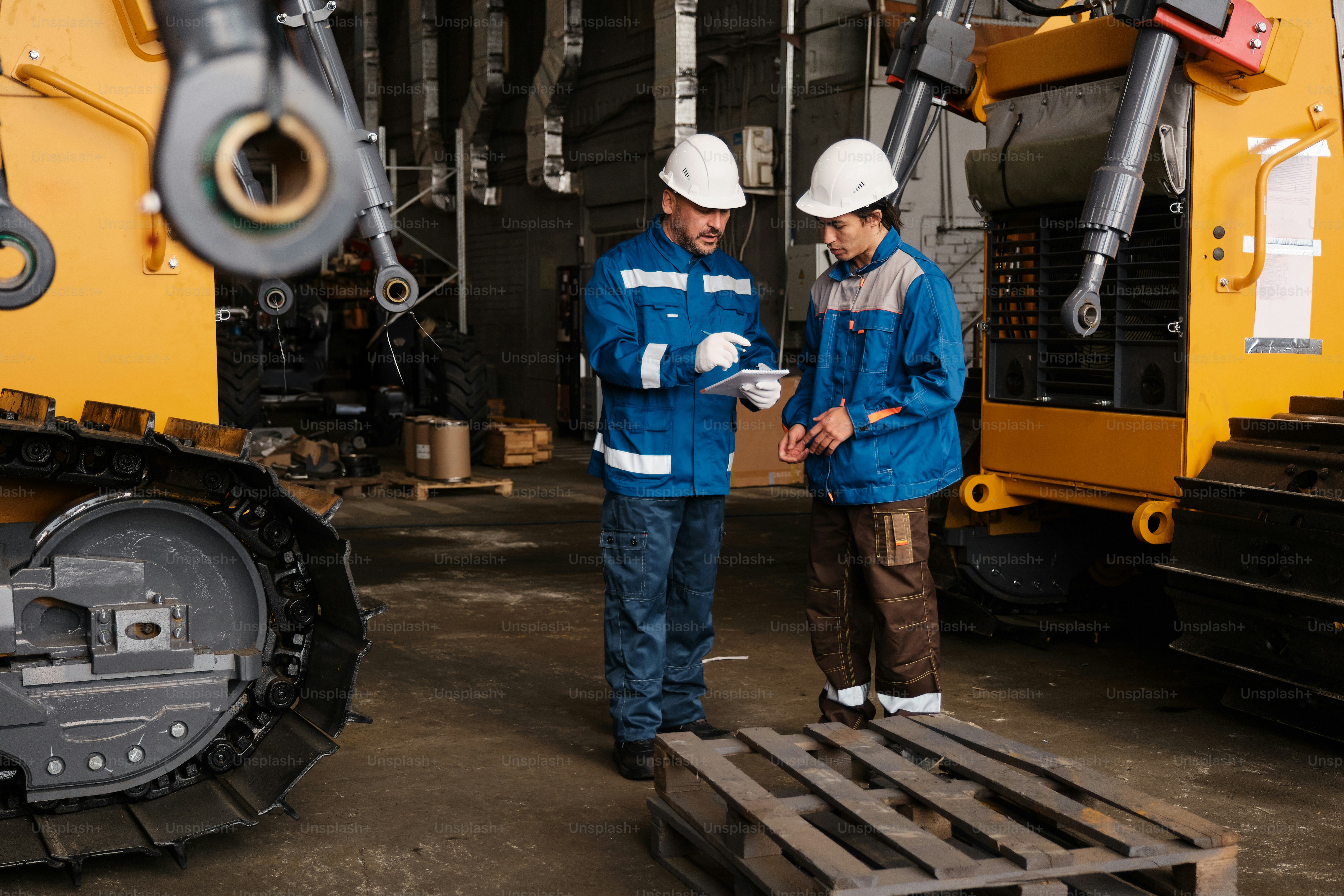 A couple of men standing next to each other