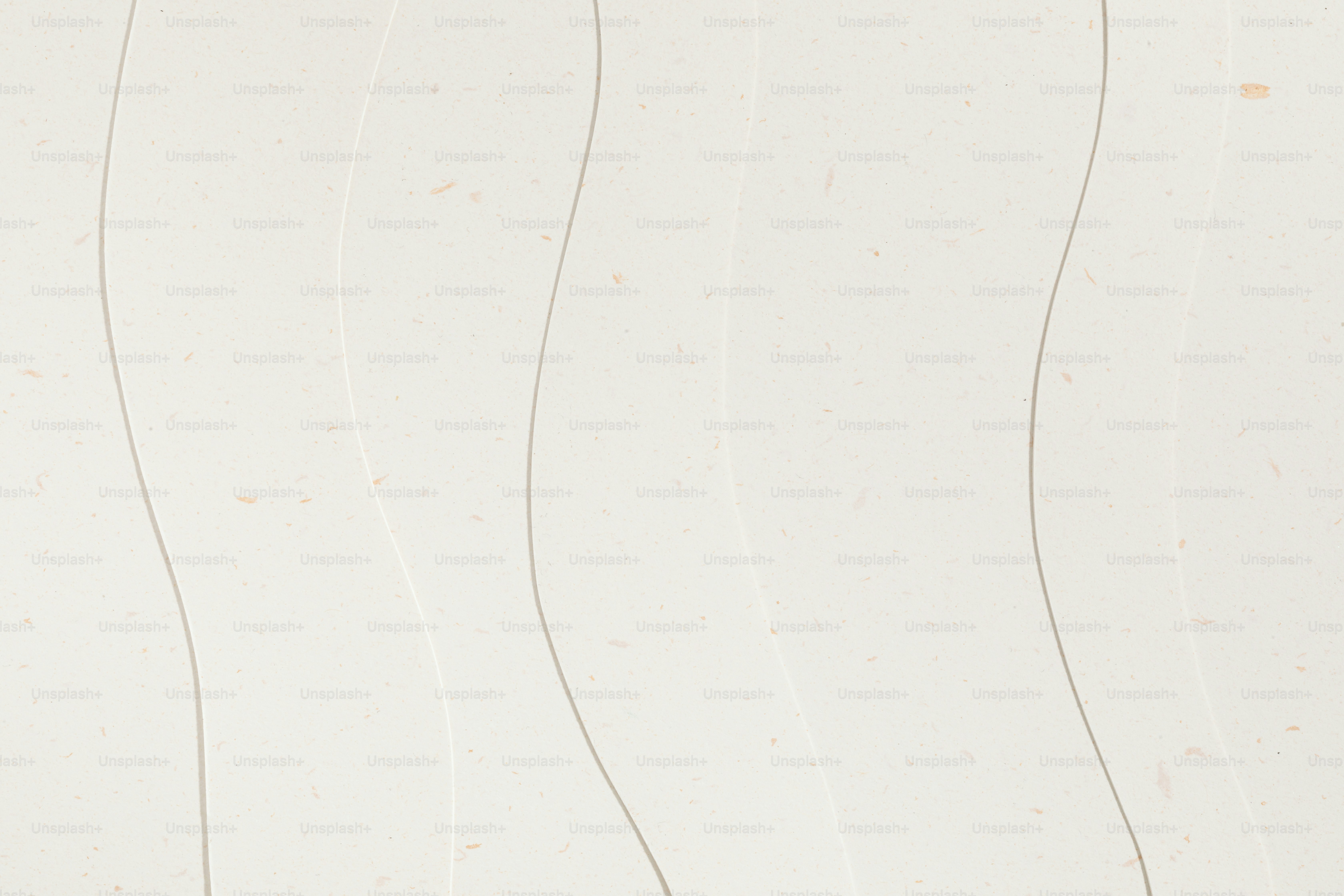 A white wall with wavy lines on it